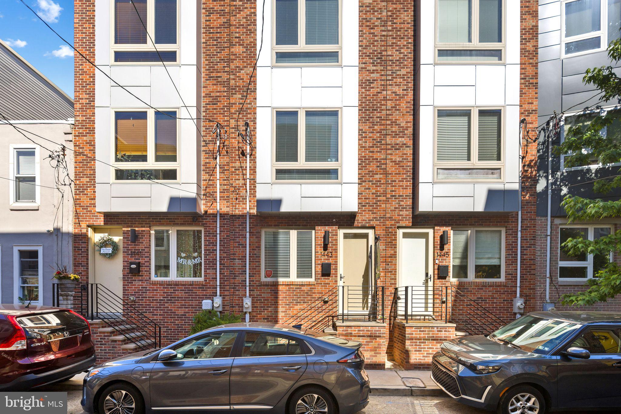 Welcome to this stunning contemporary townhome in the heart of Point Breeze, one of Philadelphia’s most vibrant and walkable neighborhoods. Ideally located just blocks from the East Passyunk corridor and minutes from Rittenhouse Square, this home offers the ultimate urban lifestyle.

The open-concept main level features gleaming hardwood floors, recessed lighting, and a chef-inspired kitchen complete with quartz countertops, custom cabinetry, and premium stainless steel appliances. Upstairs, the second floor offers two spacious bedrooms and a designer full bath, while the entire third floor is dedicated to a private Owner’s Suite with a walk-in closet and a spa-like ensuite bathroom.

Enjoy effortless entertaining on the expansive roof deck, boasting breathtaking panoramic views of the skyline from University City to the Ben Franklin Bridge. For added flexibility, the finished lower level includes a second living area and a third full bathroom—perfect for a home office or guest suite. With a remaining 10-year tax abatement still in place, this home offers incredible value in a prime location. Schedule your tour today!
