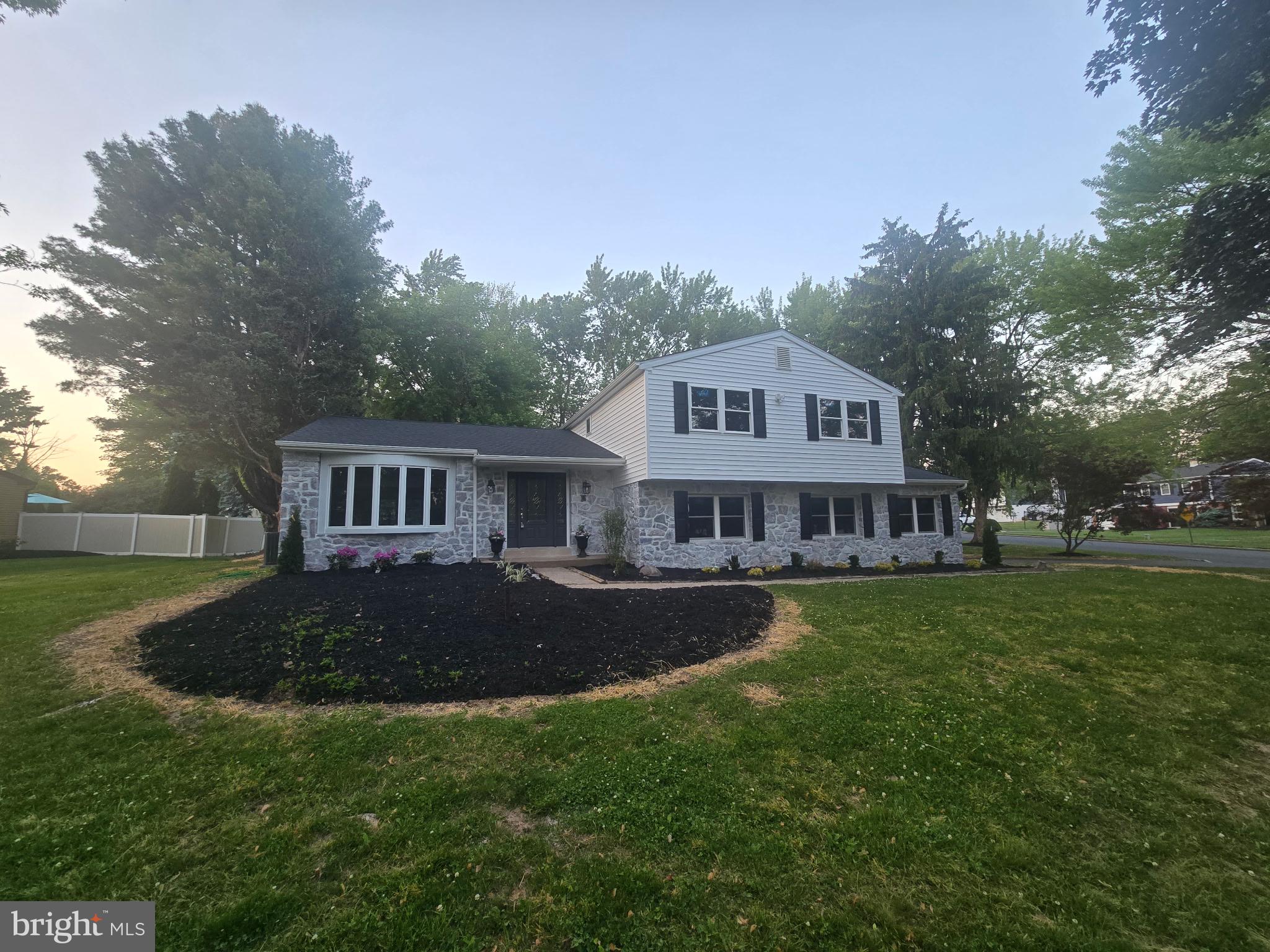 This Lovely and Spacious Colonial Split is Located in Sought after Deerfield North and has been Totally Renovated. Features New Roof, New Siding, New Garage Doors, and New Shutters. Inside there is an incredible Open Floor, New Kitchen, New Quartz Countertops, and New SS Appliances, the Living Room has a very Large Pella Bow Window. There is Recessed Lighting, and French Doors that lead to a Nice Size Deck and View of over a Half Acre Corner Lot. Upstairs there are Four Nice Size Bedrooms and Two Beautiful New Baths. From the Two Car Side Entry Garage there is an Oversized Laundry Room, Remodeled Powder Roon and Nice Size Family Room with Fireplace. In addition, there is Beautiful Neutral Flooring Throughout.  These are only a few of the Many Amenities Included. Seller can provide a Quick Closing if needed.