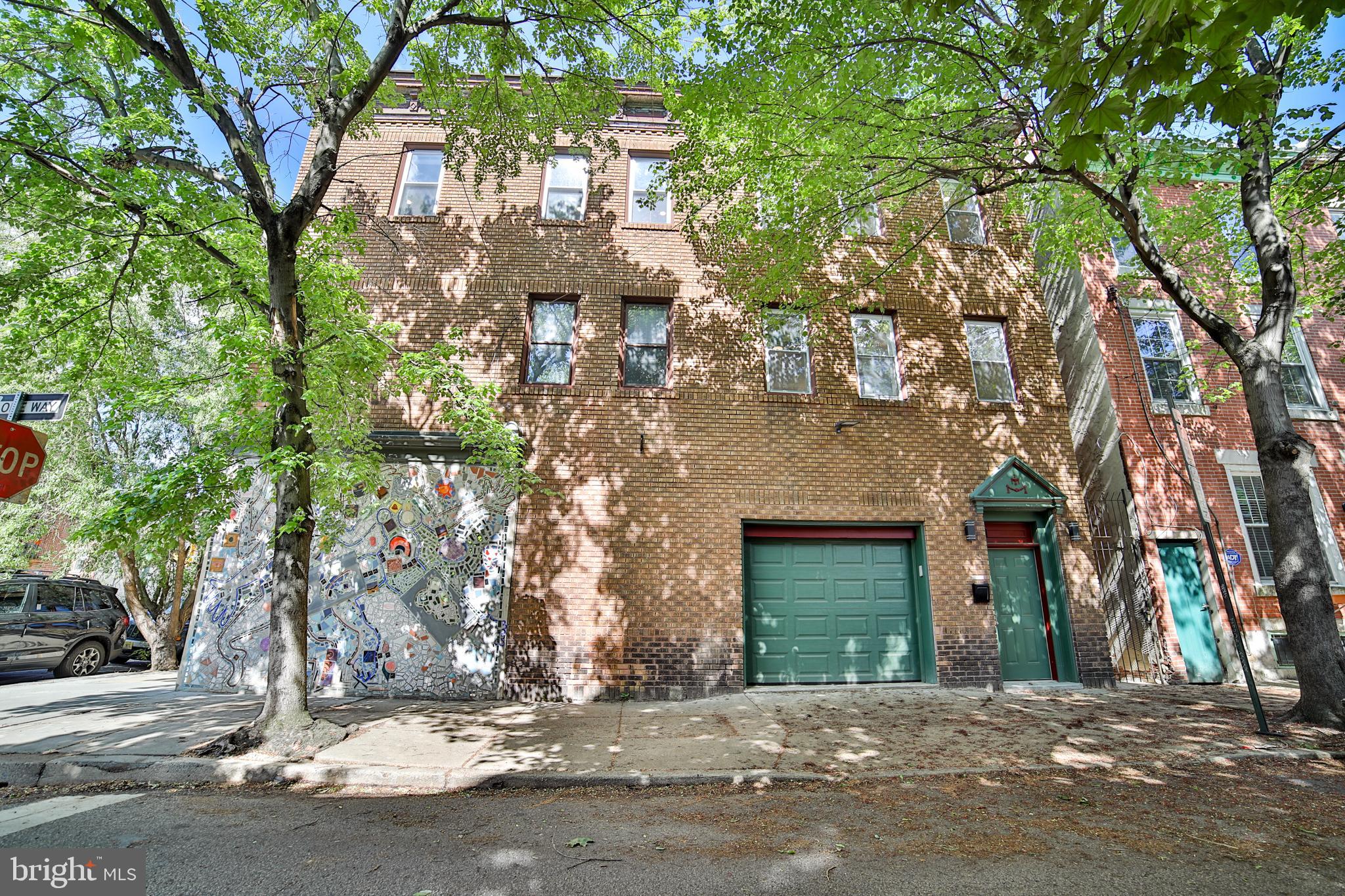An Extraordinary Dual-Property Opportunity in the Heart of Philadelphia. Welcome to 1037 Bainbridge Street located in the heart of Washington Square West/Bella Vista. A rare and unparalleled offering—two architecturally significant, artfully crafted residences located in one of Philadelphia’s most sought-after neighborhoods. These adjacent properties represent a golden opportunity for discerning homeowners, investors, or those seeking a distinctive multi-residence compound in the heart of the city. Together, these properties deliver over 3,000 square feet of meticulously designed living space across multiple levels, blending modern elegance with Philadelphia’s iconic artistic soul. The exterior is graced with original mosaic works by renowned artist Isaiah Zagar, tying them into the cultural fabric of the nearby Philadelphia Magic Gardens. At 1035-37 Bainbridge Street #B, oversized windows and soaring ceilings create an airy, open feel, while stylish finishes and thoughtful details set the stage for comfortable, elevated living. The main level boasts a bright living space, sleek kitchen with room to dine, and a contemporary bath—the ideal space for entertaining or simply to unwind. Upstairs, two generous bedrooms offer leafy views and extra-large closets, while a designer-inspired bathroom adds a touch of spa-like serenity. A fully finished basement provides flexible bonus space—perfect for a creative studio, home office, or media lounge. Plus, enjoy the convenience of second floor laundry and the comfort of a brand-new systems, electric and plumbing. Additionally, 628 S. Clifton Street, meticulously designed with both modern elegance and artistic flair, this property boasts soaring ceilings, wood railings, rich moldings, and thoughtfully finished living spaces throughout. Spanning three expansive levels plus a fully finished basement, the home offers flexible living arrangements ideal for all, the possibilities are endless. The ground level offers basement access and private garage parking with a custom-painted floor, stunning. On the second level is a one-bedroom suite, fully turn key with modern finishes and a luxurious kitchen and bath. The third floor offers 2 beds and 2 full baths with a stunning primary en-suite bathroom. And all the way up is the crown jewel, the massive private roof deck! enjoy panoramic views of the Center City skyline and indulge in evenings set aglow by city lights or festive fireworks on the 4th of July. Both properties come equipped with premium brand appliances (including Forno and Kohler) and are finished to the highest standards. Whether utilized as two independent luxury residences, an income-generating compound, or a combined live/work estate, the possibilities are endless. A one-of-a-kind, homeowner or investment-grade opportunity in Philadelphia’s most vibrant, artistic, and walkable neighborhoods. Make your appointment today before it’s too late!