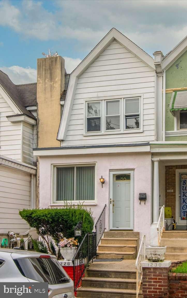 NOW OFFERING a $5,000 Buyer Credit Towards Closing Costs for an Acceptable Offer By 1/31/2023! Welcome to this charming 3-bedroom, 1.5-bathroom townhome nestled on a serene tree-lined street in the heart of the Overbrook Neighborhood in Philadelphia. This home has been tastefully updated, boasting fresh flooring and paint throughout, making it a delightful, move-in ready space for you and your family. As you enter the home, you're greeted by a spacious and luminous first floor, featuring a beautifully remodeled kitchen. The kitchen is a chef's dream, equipped with elegant white shaker cabinets, sleek stainless-steel appliances, and pristine white granite countertops complemented by a stylish white tile backsplash. Venturing to the second floor, you'll discover two generously sized guest bedrooms, as well as a primary bedroom flooded with natural light, creating a warm and inviting atmosphere. The primary bedroom also features a large closet, offering ample storage space for your belongings. Adjacent to the bedrooms, an updated bathroom awaits in the hall, ensuring both style and convenience. The lower level of this home is finished and features a separate laundry room and powder room. This finished space is perfect place to wathch sports, craft or play space. Additionally, the property includes a convenient one-car garage located at the back, adding a touch of practicality to your everyday life. Beyond the charms of this home, its location is truly unbeatable. Enjoy the ease of access to downtown Philadelphia, the scenic Schuylkill River Drives, bustling City Avenue shopping areas, the prestigious Main Line, and the esteemed St. Joseph's University. Whether you're commuting to work, exploring the city, or simply running errands, you'll find everything within reach. This residence offers not just a home, but a lifestyle – one of convenience, comfort, and contemporary elegance. It's a place where you can simply drop your bags and start enjoying all that Philadelphia has to offer. Don't miss the opportunity to make this house your home. Schedule a viewing today and envision your future in this delightful abode!