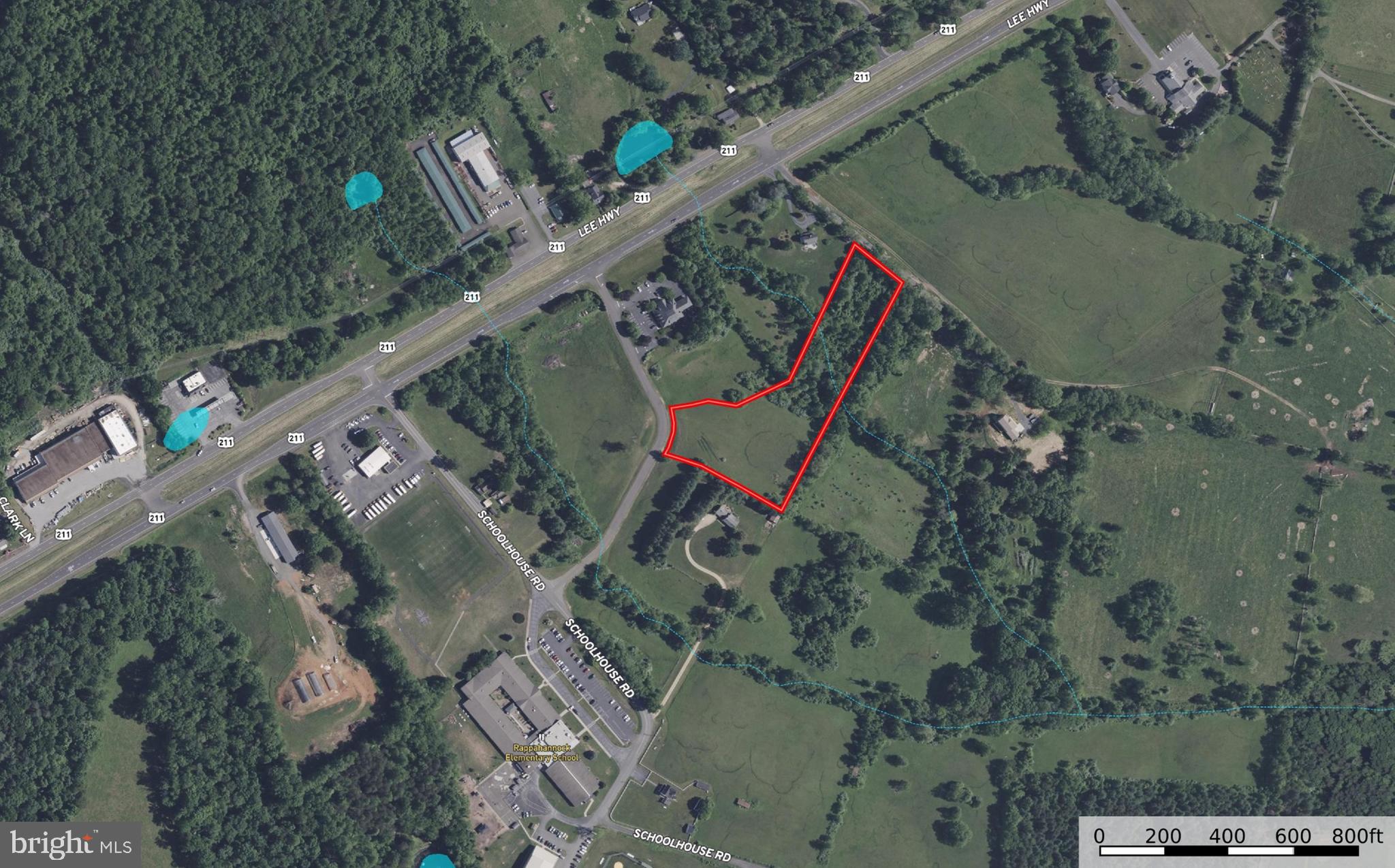Check out the Virtual Tour! - ONLINE AUCTION — This Valuable property will be sold at online auction: bidding opens Tuesday, August 4, 2026 and closes Tuesday, August 11, 2026 at 12:30 PM.   The 4.81± acre parcel in Rappahannock Commons Professional Center is zoned Commercial General (CG) and, by proffers designated for professional offices.  Approximately 15,000 sq. ft. of building are allocated to this lot; additional uses may be approved by the declarant. The rolling, well-drained topography offers attractive building sites. The land is located in the heart of the county's civic and school district — adjacent to the elementary school and school board administrative offices, and anchored by Atlantic Union Bank (formerly Rappahannock National Bank), whose landscaped campus demonstrates the finished potential of the parcel. Rappahannock Commons has excellent visibility with frontage at the Route 211 entrance to Bank Road, served by a deceleration lane. A cross over on 2111 serves a second entrance via Schoolhouse Rd.  VDOT counts approximately 5,800–6,200 vehicles per day on Business Route 211. This is a rare opportunity to build professional office space serving the Washington, VA area, where demand is driven by county operations and The Inn at Little Washington. - Note - The listed price is not an offering price but a suggested opening bid.