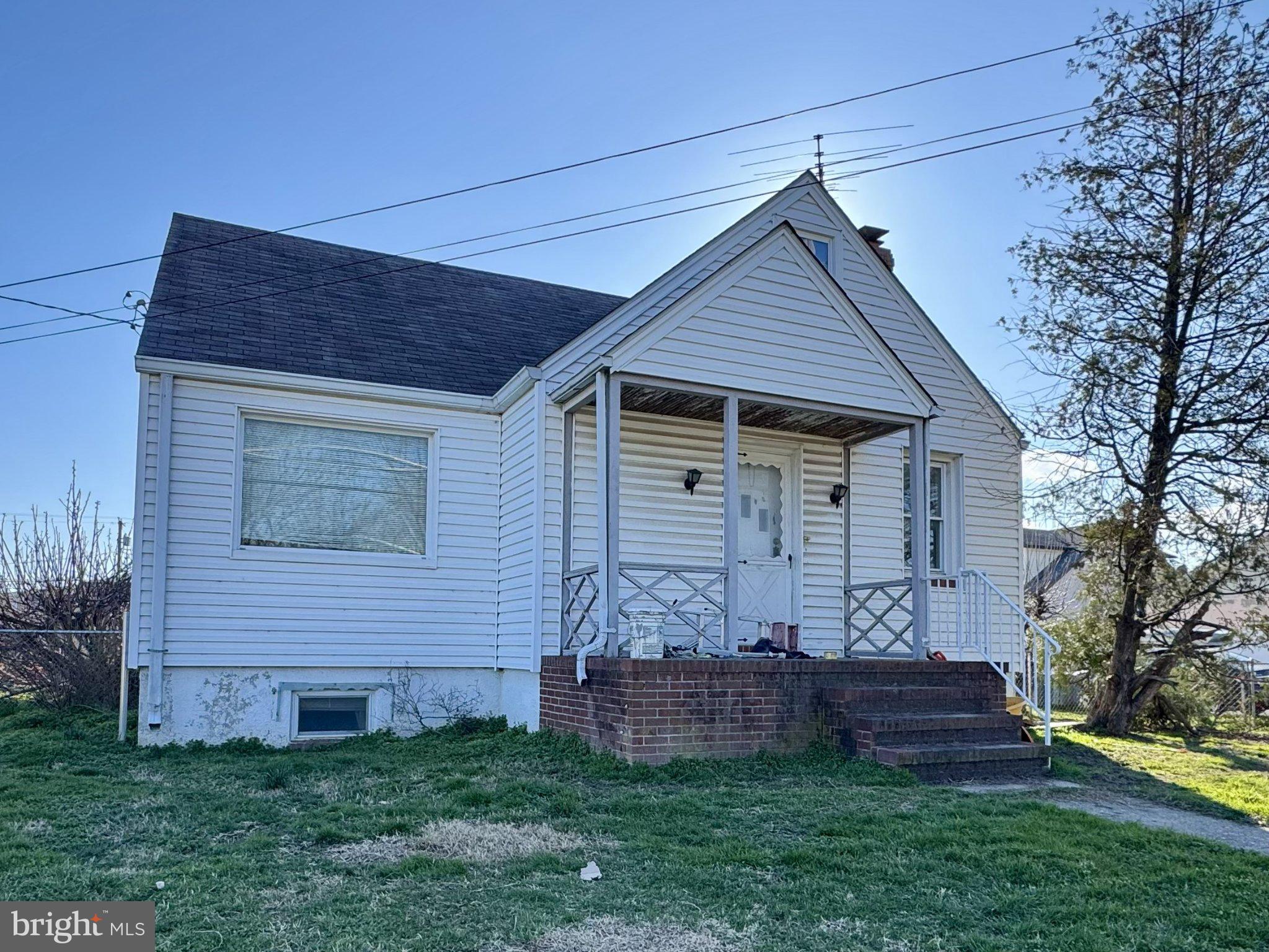 Investor Alert!!!! This unique detached residential property, built in 1947, offers a solid investment opportunity with a lot size of 0.21 acres, and includes the additional 0.09 acre parcel behind the home for potential expansion or development on a total 0.30 acre lot. The interior features a second kitchen and an attic, providing versatile space for various uses, whether for rental income or personal enjoyment. The combination of ceramic tile, concrete, and hardwood flooring enhances durability and appeal. The full basement adds significant value, offering potential for additional living space or storage. This home also offers 3 bathrooms, 2 kitchens, gas fireplace, parking in the front and rear, privacy fence, 4 10ft gates, the electrical box and gas have been upgraded, while the hot water heater, furnace and plumbing are in fair condition, new sump pump with emergency backup has been replaced and installed. But if you prefer, tear down the existing dwelling and build your dream home with ample expansion on the additional lot!! Walk to stores, schools, restaurants, Historic Battle of North Point Park (War of 1812).... many possibilities for this property and additional lot!!!! Call now to schedule your private showing! Explore the possibilities this property offers for your investment portfolio, as it is zoned Residential and Commercial!!!