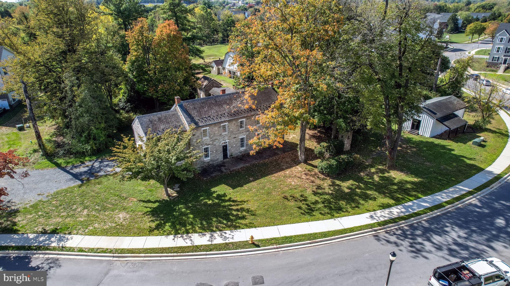 Embark upon a trip into history by owning this unique historical enclave in the heart of the City of Frederick!  

Enjoy 2.79 acres on 4 tax parcels of Frederick agricultural history nestled in the newly completed Belle Air Farm community and adjacent to Rock Creek linear park.  This property is adjacent to a new shared use path that provides pedestrian and bicycle connectivity directly into historic Downtown Frederick, Baker Park, and all the modern amenities you will find in one of Maryland's largest cities.  

Comprised of a beautifully constructed and ready-to-occupy 4-bedroom, 2.5-bathroom stone house originally built in 1780, a stone smokehouse, tenant/guest house, and 6 agricultural buildings, this enclave of Frederick’s agricultural history is ready for its next steward.  The offering also includes 2 buildable single family detached lots.

A Historic Preservation Overlay (HPO) has been placed on most of the property which permits for additional residential and commercial uses. Inactive structures inside the HPO must remain in mothballed condition per the City.  This property also includes 32 remaining units of density from the Belle Air Farm PND zoning allowing a buyer to construct various permitted residential units subject to City approvals, and is primed for a buyer looking to bring their creative eye to a once-in-a lifetime historic project.