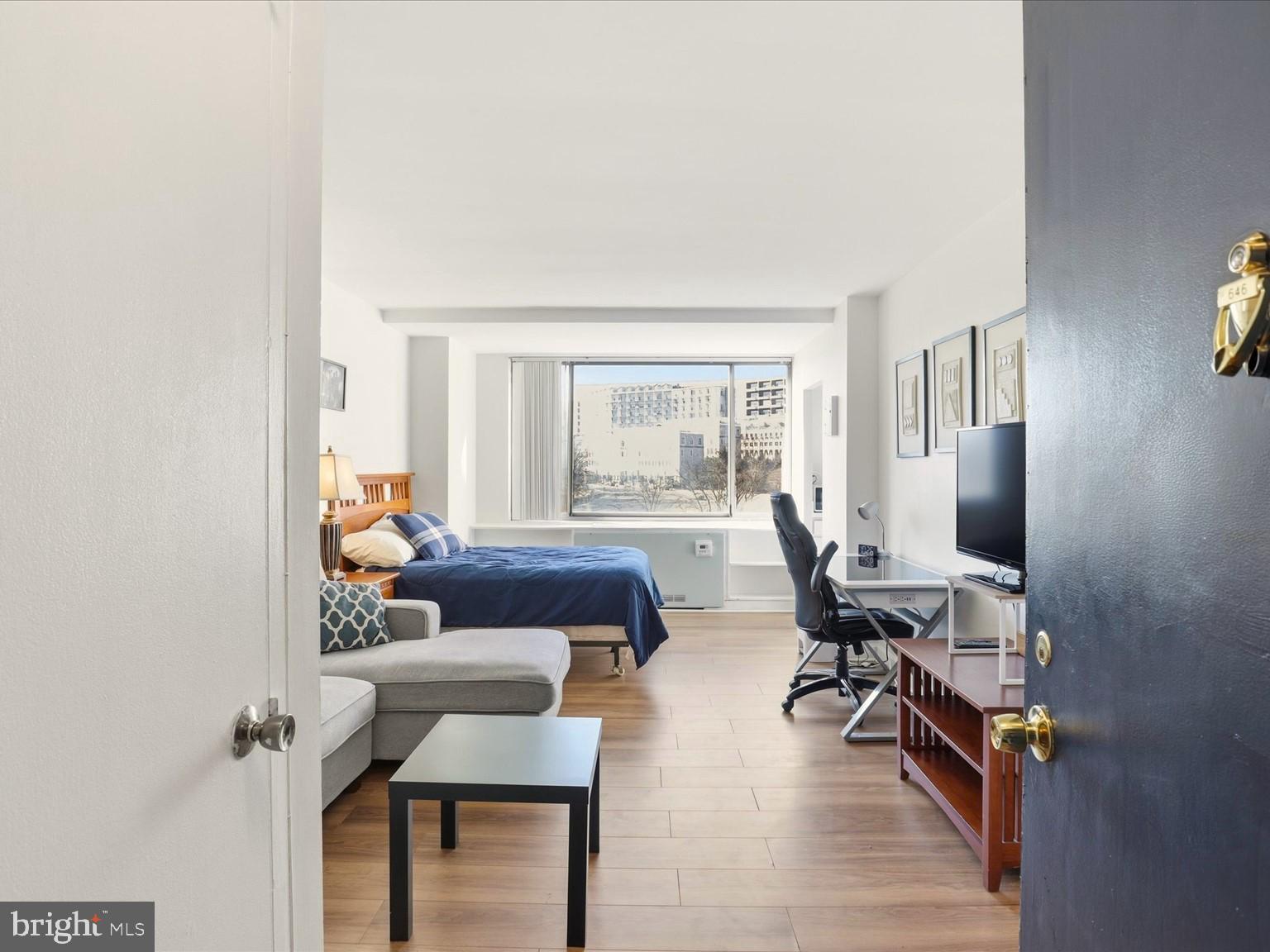 Newly vacant and move in ready, this 6th-floor studio at 1111 Arlington Blvd #646 offers a rare entry point into one of Arlington’s most connected, high-demand locations. minutes from Washington, DC.

With 383 sq ft of efficiently designed space, this thoughtfully updated unit features light wood-style PVC flooring, a streamlined galley kitchenette, a full bath, and a large window showcasing skyline views of Arlington. No balcony, no wasted space. Just a clean, functional layout that maximizes every square foot.

Located in a high-rise co-op community where many units are held long-term, opportunities like this don���t come up often. Whether you're a first-time buyer looking for a low-maintenance home base near the city or an investor seeking strong rental potential, this unit checks the boxes.

Previously tenant-occupied the unit is now vacant and presents immediate upside, with market rents in the building trending closer to $2,000–$2,200/month.

Residents enjoy full-service amenities including an outdoor pool, fitness center, on-site mini market with coffee shop, convenience store, hair salon, billiards room, and dedicated recreation spaces, all within the building.

A simple, smart footprint in a location that keeps you close to everything. Commuting, dining, and city life made easy.