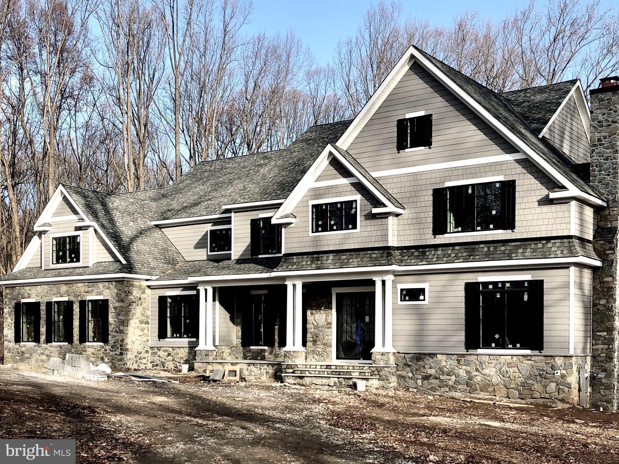 Nearly finished! Very special location which is seldom available.  This magnificent custom design/built home by Alan Klatsky's award winning Prestige Development Inc., features all the best money can buy.  The expansive open floor plan is highlighted by 10 foot ceilings, generous open spaces, fabulous finishes, all set on a private 2.5 acre lot in the coveted Golf Course Road community. This home includes 6 bedrooms with 7 and a half baths along with an additional first floor convertible bedroom.  Additionally, you will find a large library, huge family room (punctuated by a boxed coffered ceiling), with wet bar, true chefs kitchen with Wolf/Subzero appliances, and a banquet sized dining room with tray ceiling. The upstairs has 5 gracious bedrooms including the enormous master suite.  Outside, you will find lots of bluestone hardscape including the covered front porch and rear patio.  A covered deck off of the breakfast/family room gives you ample opportunity to enjoy the privacy of your rear entertaining area. The lover level is a full walk out with french glass doors leading out to the bluestone patio from the club room and lower level bedroom suite.  The cabinetry, tile work, lighting, hardwood flooring and millwork, will truly impress.  This home is truly a winner.  Available this March!