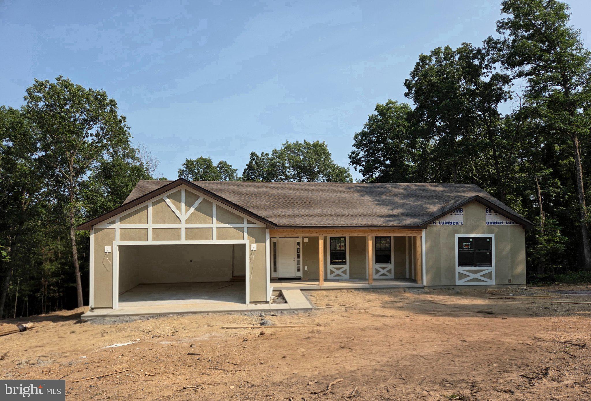 Nearing Completion! With over 20 years building experience, Highland Ridge Builders welcomes you to your fresh start in the heart of Virginia's countryside. This brand-new construction home offers 1,850 square feet of thoughtfully designed living space on a sprawling 5.25-acre lot — room to roam, room to grow, and room to make it truly yours.

Step inside to an open-concept floor plan that fills the home with natural light and effortless flow, perfect for everyday living and entertaining alike. Generously sized bedrooms with ample closet space provides comfortable retreats for the whole family, while the modern layout keeps kitchen, living, and dining spaces connected and welcoming. You'll appreciate numerous upgrades throughout: granite counters including bathrooms, 36" kitchen cabinets with soft-close hardware, ceiling fans in all bedrooms and living areas, ceramic tile in baths and laundry, just to name a few. The oversized poured concrete porch will certainly delight with plenty of room for chairs. Let's not forget the 12x16 deck off the back overlooking the private wooded lot!

Downstairs, a full unfinished walkout basement with full bath rough-in offers endless potential — envision a home gym, media room, additional bedrooms, or the ultimate rec space, all designed to your vision. 

Outside, over five acres of land offer privacy, space for gardens, animals, a workshop, or simply room to breathe — all while being brand new from the ground up, so you can move in with zero deferred maintenance and complete peace of mind. The well and septic locations were thoughtfully placed to allow for a pool if desired. 

Whether you're looking for a peaceful homestead, room for hobbies, or simply a quiet slice of Virginia to call your own, 150 E Four Seasons Drive delivers new construction quality with the acreage and flexibility today's buyers are searching for. Built on quality and crafted for life, don't miss this rare combination of brand-new construction and generous acreage — schedule your showing today.  Contact listing agent for a walk-through video if you are unable to visit in person.