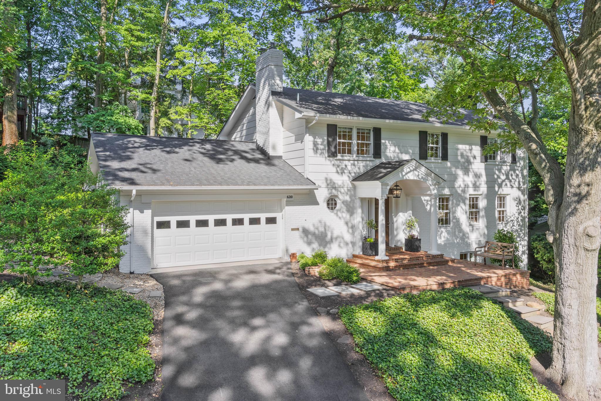 OPEN HOUSE CANCELLED   UNDER CONTRACT                                                                                                                         A classic and elegant brick Colonial in coveted Belle Haven neighborhood  with oversized 2 car garage, screened-in porch with vaulted ceilings, and amazing full-daylight basement! A spectacular home that has been exceptionally renovated and immaculately maintained. Tasteful touches throughout, nothing is out of place! Entertain in your beautiful kitchen with shiplap back splash, double ovens, and gas Wolfe Range,  host garden parties in your beautifully landscaped outdoor areas, kick back and relax (or convert to an in-law suite) in your walkout basement! Designer lights and hardware throughout. Hardwood floors refinished and crown molding added throughout.  New roof (2016), HVAC (2019), gas 75 gallon HWH (2017),  Baths have been recently renovated.  Floored attic, new chimney liner (2018). Lower level can easily be a inlaw or nanny suite with the full windows and walkout.