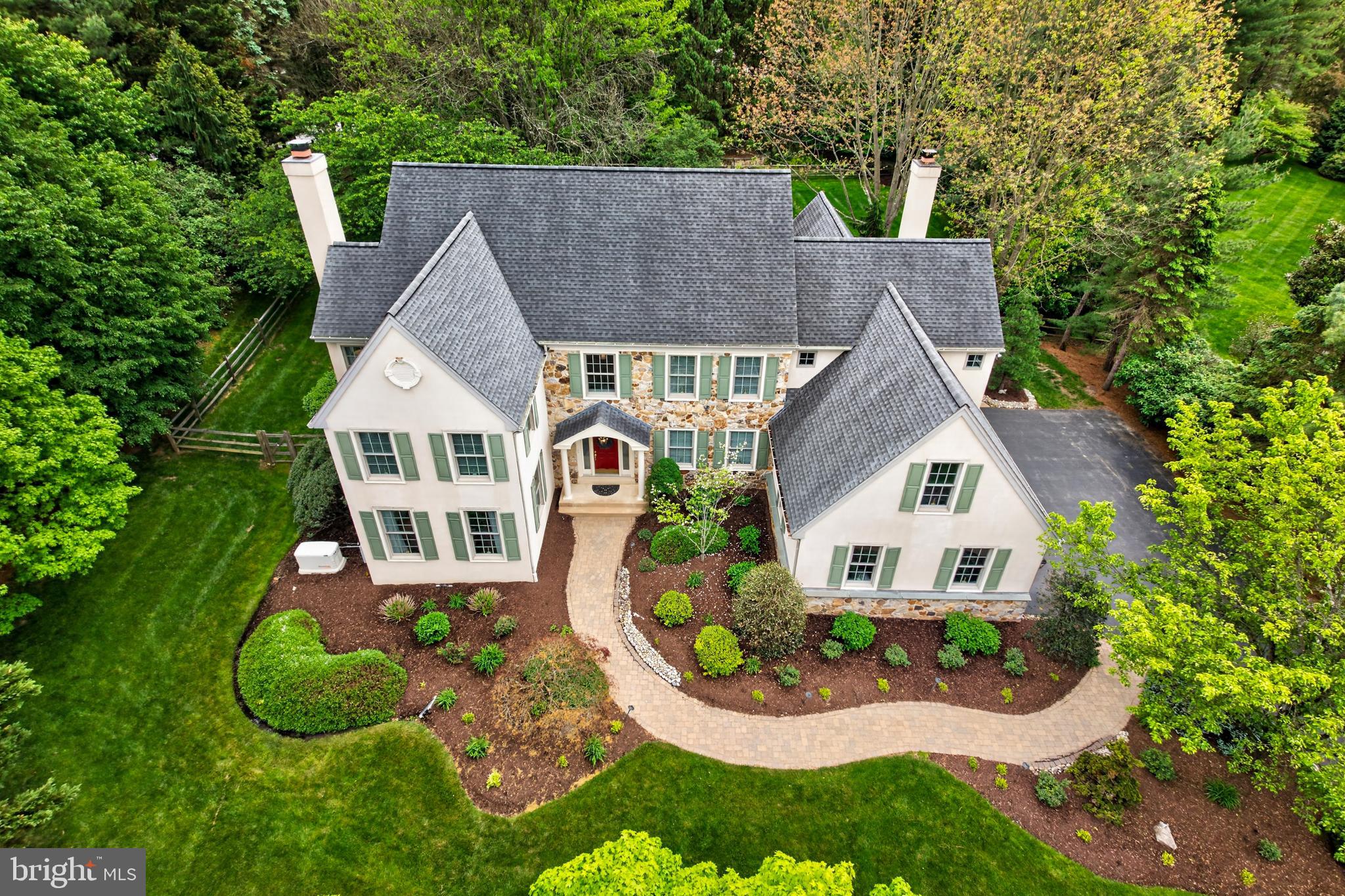 Stately Bentley Built Colonial on professionally landscaped acre in Westtown Twp. Enter into the 2 story formal foyer with site finished hardwood and a truly open floor plan and flow perfect for entertaining. 9 Foot ceilings and extensive moldings, sunny main floor office is quiet and secluded with French doors and oak built-ins, Living Room with Carrara marble gas fireplace, Dining room with corner windows provide a panoramic view while dining. Cook's kitchen with white cabinets and granite island, stainless appliances and pantry. Gas Cooking and 2 wall ovens for easy food prep. All open to a magnificent Family Room with vaulted ceiling and Built in bookcase, raised slate hearth and floor to ceiling field stone, wood burning Fireplace. Palladian window with view of the back yard and stone retaining wall in the garden. My very favorite feature of this home is right off the kitchen. You will enjoy 3 seasons in your screened in porch with room for dining and 2 conversation areas. Made with maintenance free composite decking. Porch opens to a paver patio with room for a fire bowl and seating for a crowd. Laundry room just off the kitchen with plenty of cabinet storage. Two Powder Rooms complete the main level. Back Stairs lead to Children's and Guest bedrooms. Grand upstairs hallway over looks the foyer. Double door master en-suite with private sitting room and spacious Carrara Master bath, 2 person over sized shower, custom vanity, polished nickel fixtures and separate commode room. Bedroom with private full bathroom.   Two additional bedrooms and a hall bath. Walk-in attic storage perfect for suitcases or seasonal clothing storage. Finished basement has 3 rooms and a half bath. One is soundproofed for the musician in your family or noisy teenagers. The smaller neighborhood of Avonlea hosts outdoor cook outs and camp outs in the common area and a popular book club is held monthly. All of the big jobs have been done. Roof, heating, A/C, and water heater have all been replaced in the last few years. This home has many upgrades and updates. Speakers in most rooms and outside.. Recessed lighting throughout the house. Freshly painted in neutral designer colors throughout much of the house. Ann Capron designed Glen Mary model of Bentley Builders. West Chester Schools, Bayard Rustin High School.