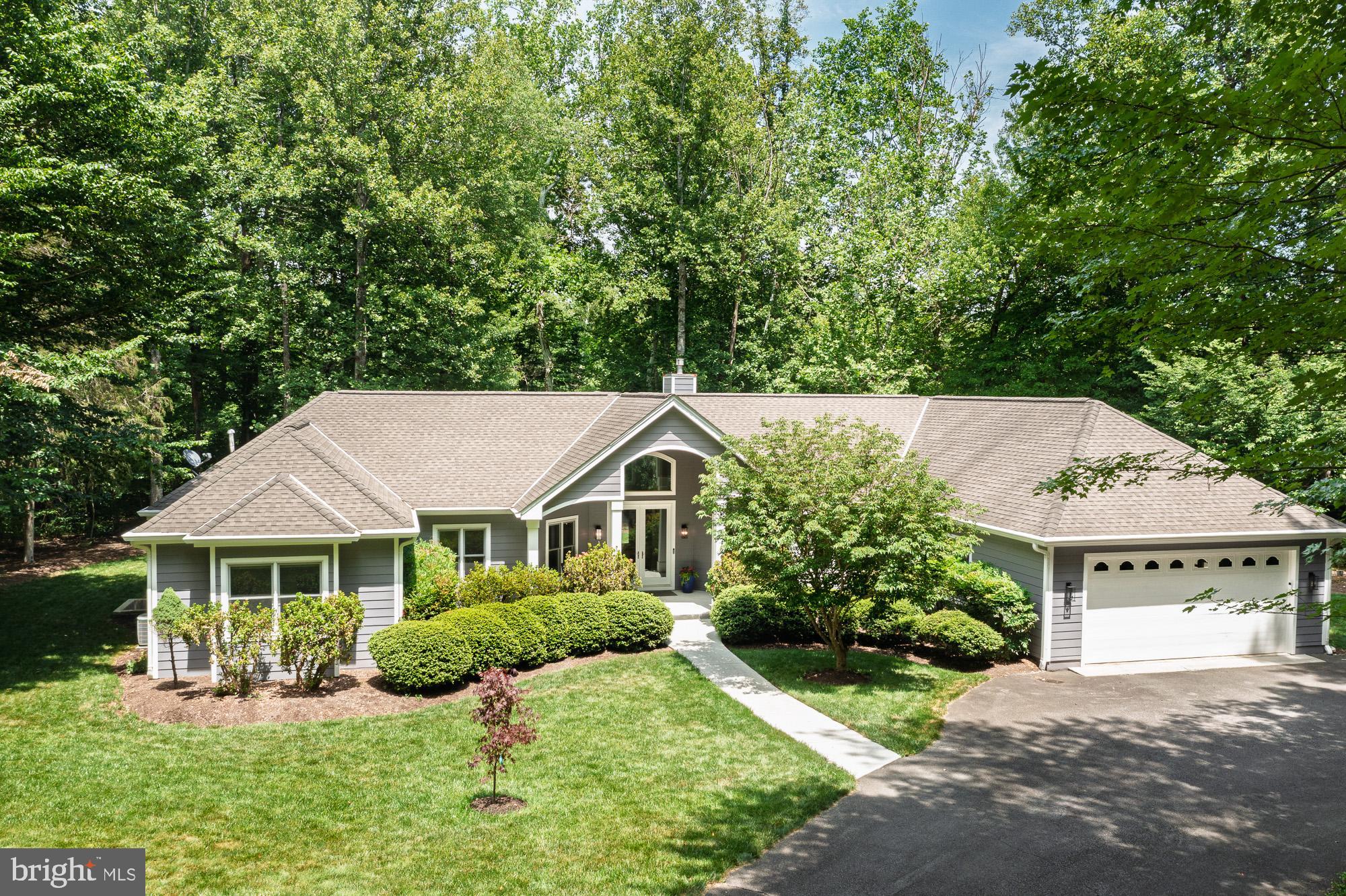 Stunning architect-designed custom home nestled on nearly one acre in a quiet cul-de-sac, offering exceptional privacy and a peaceful natural setting across from Allen Creek Nature Preserve and backing to the wooded buffer of the golf course. Enjoy seasonal views of Tuckahoe's 5th fairway and green, with expanded vistas in the fall and winter, plus direct access to the course from your own backyard while remaining well set back for added privacy.

This meticulously maintained one-level home offers 2,874 square feet with 3 bedrooms and 2.5 baths, showcasing outstanding attention to detail and quality craftsmanship throughout. Dramatic window walls fill the bright, open floor plan with natural light and beautifully frame the surrounding landscape. The screened porch with EZ Breeze windows extends your outdoor enjoyment through multiple seasons, creating the perfect place to relax and take in the tranquil surroundings.

Thoughtfully enhanced with approximately 20 trees, shrubs, and landscape plantings, the property offers a picturesque, park-like setting and additional privacy. Additional upgrades and the exceptional care and maintenance make this home truly stand out. A rare opportunity to own a beautifully designed home where nature, privacy, and golf course living come together.