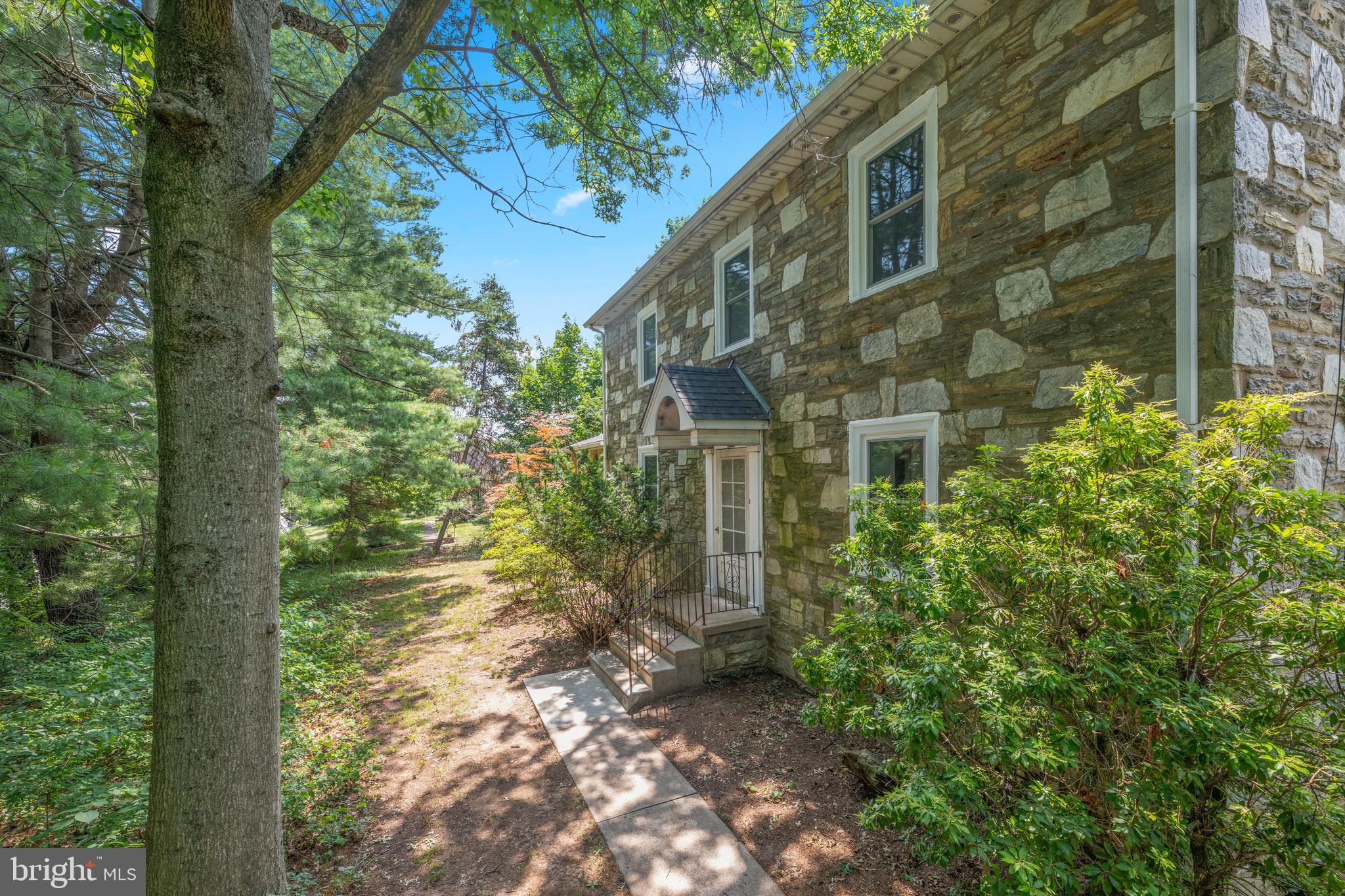 Welcome to this exceptional 3,545 Square-foot stone single family home offering timeless charm, quality craftsmanship, and room to grow! Featuring 4 spacious bedrooms and 2.5 baths, this beautifully maintained home boasts generous-sized rooms, aoriginal hardwood floors, and tile throughout. The expansive eat-in kitchen provides abundant space for cooking, gathering, and entertaining. A flexible floor plan offers potential for an in-law suite or multigenerational living. Recent updates include brand-new windows, a newer roof, and a new deck, creating peace of mind and the perfect outdoor space to relax or entertain.  Also, outside you'll find a detached one-car stone garage a driveway with parking for three vehicles, plus two additional off-road parking spaces. A large storage shed provides ample room for a tractor, lawn equipment, gardening tools, and more. Conveniently located near shopping, dining, schools, and major commuter routes, this move in ready home offers the perfect blend of classic elegance, modern updates, and everyday convenience.