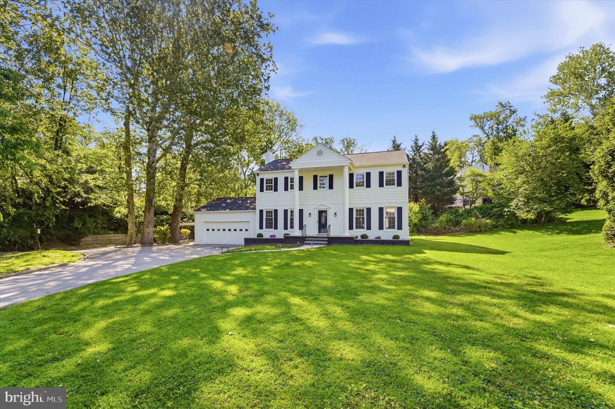 704 Crooked Lane in Gulph Mills presents a striking transformation where classic architecture meets a full modern renovation in a highly desirable King of Prussia-area location. Behind its stately brick façade and commanding columned entry, this home unfolds into a fresh, thoughtfully redesigned interior featuring new flooring throughout and refined finishes that feel both cohesive and contemporary. 
The heart of the home is the stunning new kitchen, elevated with quartz countertops, a marble backsplash, and seamless flow into the main living spaces. Formal living and dining rooms offer timeless entertaining appeal, while the spacious family room with fireplace creates a warm, inviting centerpiece for everyday living and gatherings.
The private primary suite feels like a true retreat, featuring a generous walk-in closet and a beautifully updated marble-tiled bath with a sleek stall shower. Three additional well-proportioned bedrooms share a fully renovated hall bath, all finished in a clean, neutral palette that feels fresh, bright, and move-in ready.
Everyday comfort is elevated with a main-floor laundry and mud room, while the finished basement adds valuable flexible space for recreation, fitness, or media. Outdoor living is equally impressive with a covered rear porch overlooking the expansive backyard, creating the perfect setting for relaxing, entertaining, or dining outdoors. A built-in fire pit adds to the appeal, offering a cozy gathering space to enjoy throughout the seasons. A new well pump,  and filter system, along with professional basement waterproofing and a French drain system provide peace of mind.  A second 2 car garage offers fabulous additional parking for the car buff, a workshop or storage. 
Set on approximately half an acre with two garages, this home combines space, style, and convenience. Just minutes from King of Prussia Mall, Town Center, Main Line Shopping major highways, and regional transit, 704 Crooked Lane delivers a rare opportunity to enjoy a fully updated home in an unbeatable location.