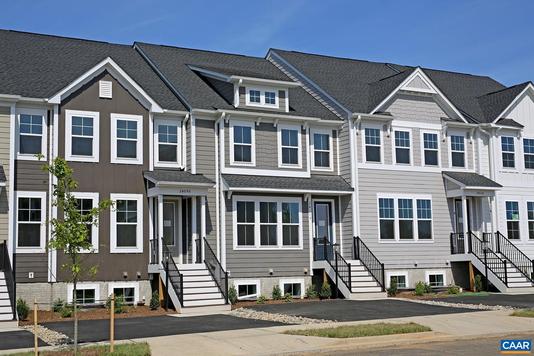 For a limited time, application fees have been waived for this property. Available July 11th - This 3 bedroom Glenbrook townhome is nestled in the quaint Crozet community. Located just west of Charlottesville, Crozet provides easy access to Charlottesville, Staunton, and Waynesboro via I-64. Enjoy proximity to local shops, restaurants, wineries, and breweries.  The 1,815 sqft home backs up to a permanently private wooded setting and boasts LVP flooring, an open living and kitchen area, quartz counters, a waterfall center island, and Frigidaire stainless steel appliances, plus a first-floor half bath, and a separate pocket office space. The top level includes a primary bedroom with a walk-in closet and a private full bath, plus two additional bedrooms that share a hall bath. A full-size washer and dryer are located on the bedroom level. Two driveway parking spaces are included, with additional on-street parking available. Residents can enjoy Glenbrook's playgrounds, fire pit areas, and stunning views of the Blue Ridge.  Up to three pets (100lbs max, combined) are allowed with fees.