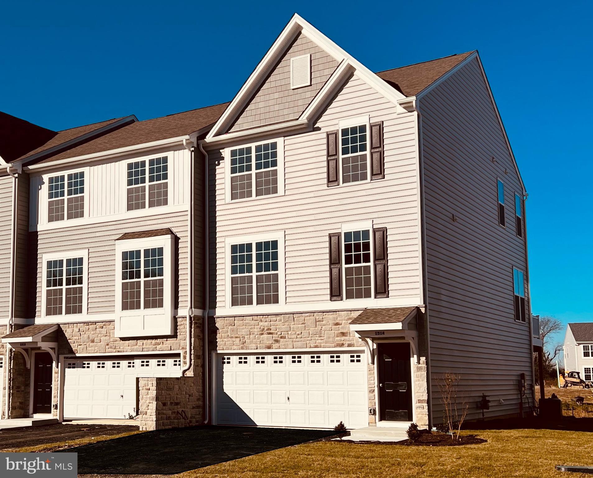 MOVE INTO YOUR NEW HOME IN THE SUMMER WITH FOUR BEDROOMS. 3.5 BATHS. ENDLESS STYLE!
This beautiful townhome has the space and flexibility you’ve been looking for—4 bedrooms, including a convenient entry-level suite, and 3.5 baths spread across three stylish levels.
The main floor’s open layout is perfect for entertaining! Enjoy 9’ ceilings, wide plank flooring, and a bright great room that flows right out to your private deck—perfect for cookouts, coffee breaks, or relaxing under the stars.
The modern kitchen steals the show with stainless steel appliances, gas cooking, quartz countertops, and an upgraded island with chic pendant lighting—a great spot to gather with friends and family.
Upstairs, your spacious owner’s suite is the perfect retreat, complete with a walk-in closet and private bath. Two additional bedrooms and another full bath make room for everyone.
The versatile lower level adds even more options—use the 4th bedroom and full bath as a guest suite, private bedroom or in-law suite! Sliding glass doors lead right outside, bringing in plenty of natural light.
Located in The Preserve, these townhomes back to open space and are part of the highly sought-after Appoquinimink School District.
Note: This home is under construction. Photos may show similar homes with comparable finishes and exteriors.