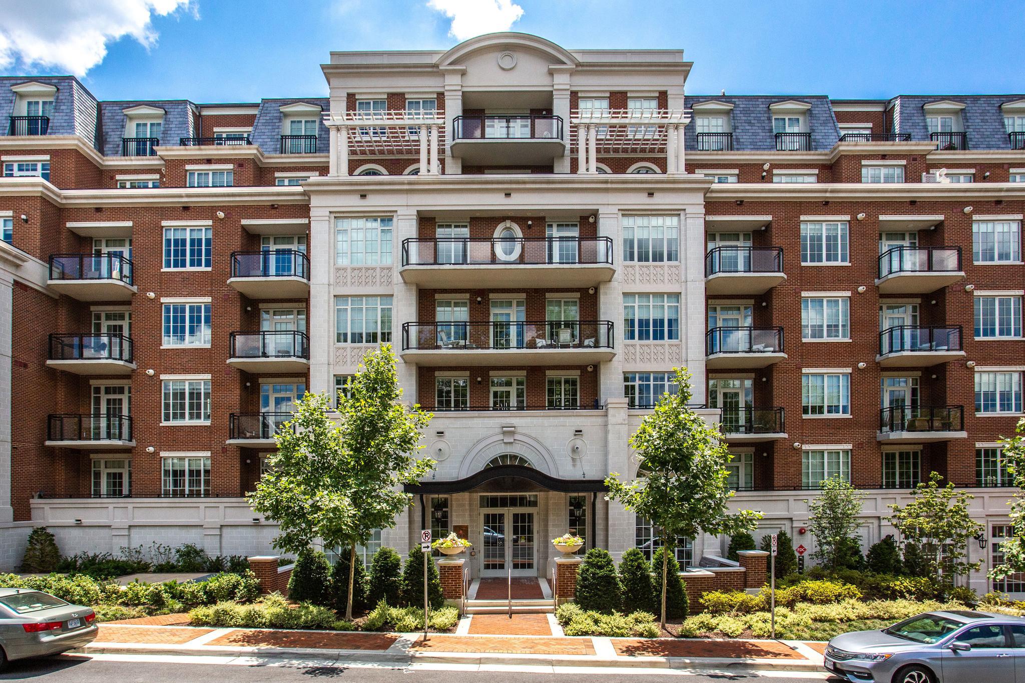 Welcome to The Signet, McLean’s premier luxury condominium community. This elegant Corner Unit 2-bedroom, 2.5-bath with DEN offers a bright, open-concept layout ideal for both everyday living and entertaining. Freshly painted and featuring beautiful luxury vinyl floors throughout, the home showcases a gourmet kitchen complete with a large island, high-end appliances, a walk-in pantry, and generous storage. The expansive living and dining areas open to a private covered balcony—perfect for relaxing or hosting guests. The primary suite is a true retreat, featuring a spa-inspired bath with an oversized shower and soaking tub, along with both a walk-in and an additional closet. The secondary bedroom includes its own walk-in closet and a spacious en-suite bath with a separate shower and tub. The light filled den has access to the balcony which can be used as a guest bedroom. Additional highlights include a large laundry room, two reserved garage parking spaces (370 & 371), and a private storage unit (B330). Enjoy exceptional resort-style amenities, including a grand lobby with full-service concierge, a beautifully landscaped courtyard with multiple lounge areas, fire pit, outdoor bar, and grilling stations with dining spaces. The community also features a clubroom, state-of-the-art fitness center, sauna, steam and massage rooms, a fitness trail, and a pet spa. MPA to open soon in the Rotonda.