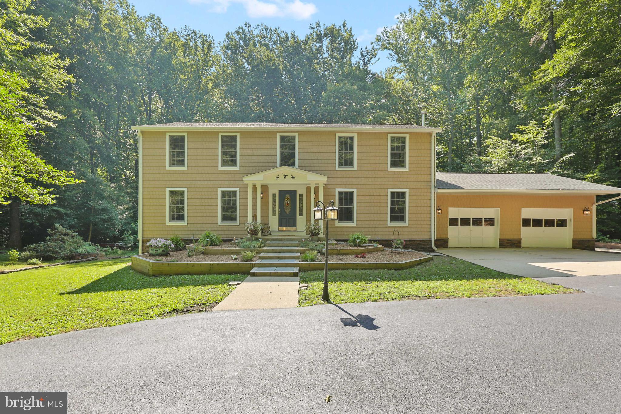 METICULOUSLY MAINTAINED CUSTOM HOME SITTING ON 2+ PRIVATE ACRES IN THE CROFTON SCHOOL DISTRICT NOW AVAILABLE! GLISTENING HAND SCRAPED BEAR TOOTH MOUNTAIN OAK HARDWOODS CASCADE THROUGHOUT. ENJOY CUSTOM CABINETRY, SOAPSTONE COUNTERS WITH SOLID BLACK WALNUT ISLAND, DESIGNER RESTORATION HARDWARE LIGHTING, UPGRADED SS APPLIANCES IN CHEF'S KITCHEN WITH LA CORNUE DUAL FUEL RANGE. 4 BEDROOMS WITH 3 FULL BATHROOMS. SOLID CORE 5 PANEL DOORS WITH BALDWIN HARDWARE. PET FEEDING & WATERING STATION. 2 PROPANE FIREPLACES. MOTION ACTIVATED LIGHTING THROUGHOUT. FULLY CUSTOM GARAGE WITH COMMERCIAL GRADE FLOORING AND BUILT INS - MUST SEE! FOUR SEASON SUNROOM. 3 SEASON COVERED AND SCREEN OUTDOOR LIVING ROOM. LARGE TREX DECK LEADING TO ISOLATED PAVED DOG WALK ENDING IN 1/2 ACRE WOODED DOG RUN.  WHOLE HOME GENERATOR. TONS OF NATURAL LIGHT. PRIVATE OUTDOOR OASIS WHICH INCLUDES BEAUTIFULLY LANDSCAPED YARD. CLOSE PROXIMITY TO RETAIL SHOPPING, LOCAL DINING, AND ALL MAJOR HIGHWAYS. SCHEDULE A PRIVATE TOUR TODAY.