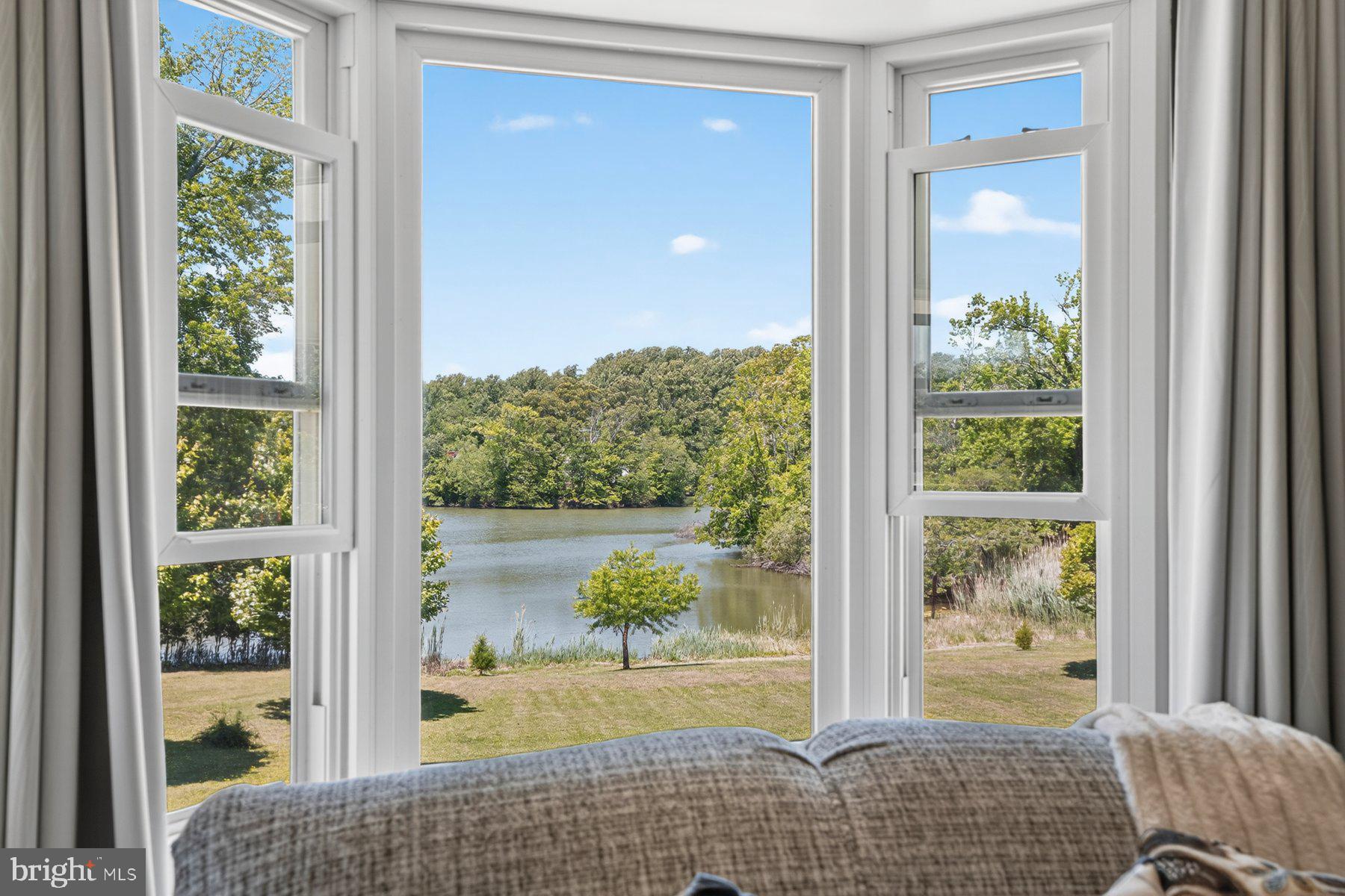 Nestled at the end of a peaceful peninsula in the sought-after Saunders Point community, this unique property offers a rare opportunity to enjoy the Chesapeake Bay and South River lifestyle surrounded by nature and tranquil water views. Comprised of two separately deeded parcels being sold together, the property includes a charming three-bedroom, two-and-a-half-bath rancher and an oversized detached two car garage.

Overlooking a serene 19-acre tidal basin with direct riparian rights, the property is ideal for outdoor enthusiasts with opportunities for kayaking, canoeing, fishing, crabbing, and enjoying the peaceful waterfront setting right from your backyard. The home offers comfortable one-level living with a cozy gas fireplace, partially finished basement, attached one-car garage, and workshop space, while the oversized detached garage provides excellent storage for cars,  tools, outdoor equipment, kayaks, and more. The property also backs to county parkland, enhancing the peaceful and private, natural setting.

Residents of Saunders Point enjoy access to a private beach, community pier, kayak launch, and tot lot, with nearby marinas offering additional boating access and storage options. Both lots are being sold together, and a portion of the driveway servicing the main residence is located on the adjoining parcel.

A special opportunity for nature lovers seeking privacy, water views, and a relaxed coastal lifestyle just minutes from everyday conveniences.