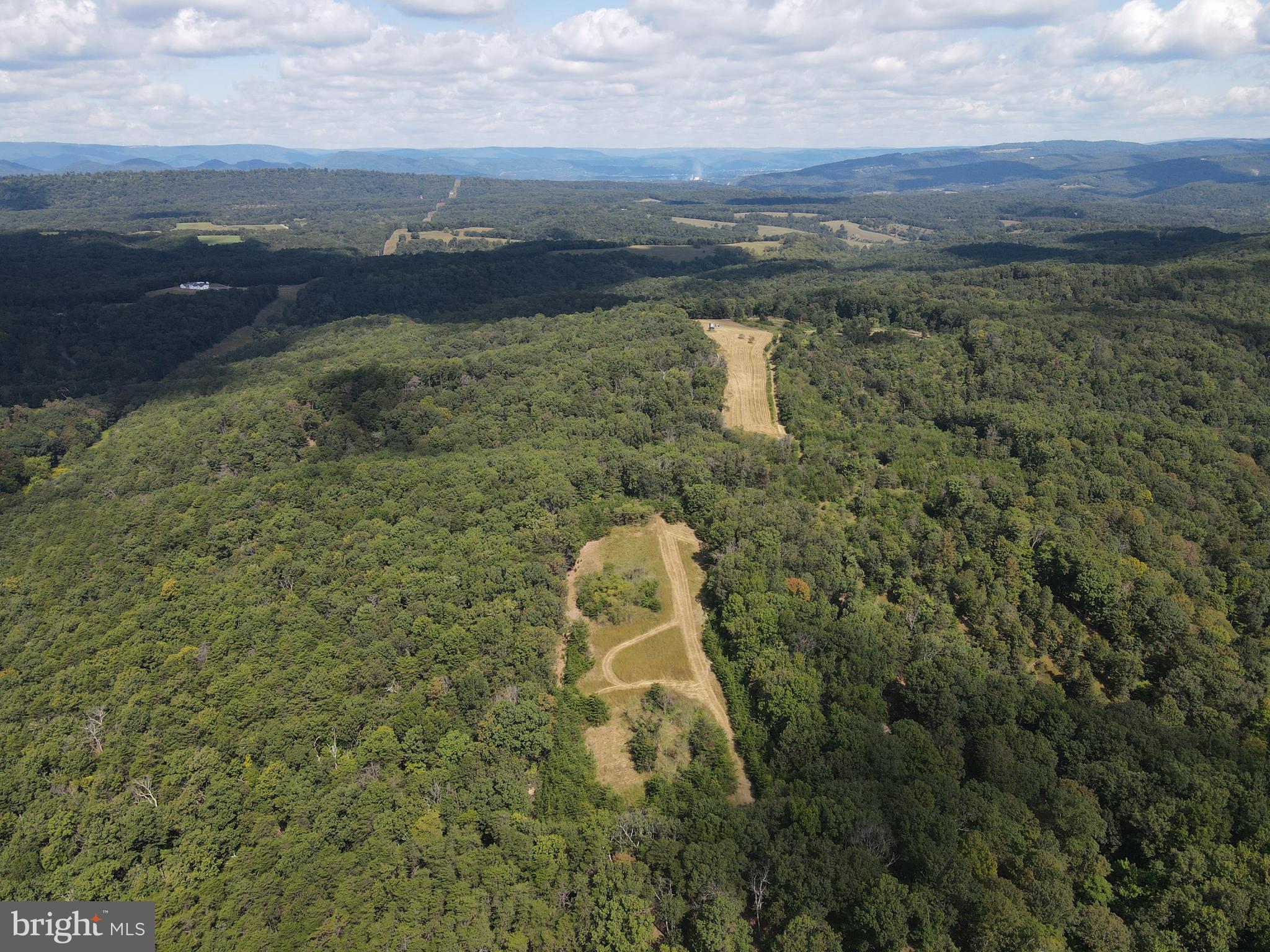 CALL NOW TO SEE THIS 154+ ACRE UNRESTRICTED PROPERTY. THIS PROPERTY OFFERS BEAUTIFUL VIEWS OF THE WEST VIRGINIA MOUNTAINS. SELLER'S HAVE UPGRADED THE GRAVEL DRIVE INTO THE PROPERTY FOR EASY ACCESS TO THE OPEN FIELDS ON TOP OF THE MOUNTAIN. THIS IS A WONDERFUL SPOT TO BUILD YOUR DREAM HOME OR WEEKEND RETREAT. THERE ARE NUMEROUS TRIALS THROUGHOUT THE PROPERTY FOR ACCESS TO ALL CORNERS OF THE PROPERTY. IF YOU LIKE TO HUNT, THERE ARE SEVERAL HUNTING BLINDS ALREADY IN PLACE. JUST BRING YOUR ATV'S AND YOU WILL BE READY TO ENJOY THIS SECLUDED PROPERTY.