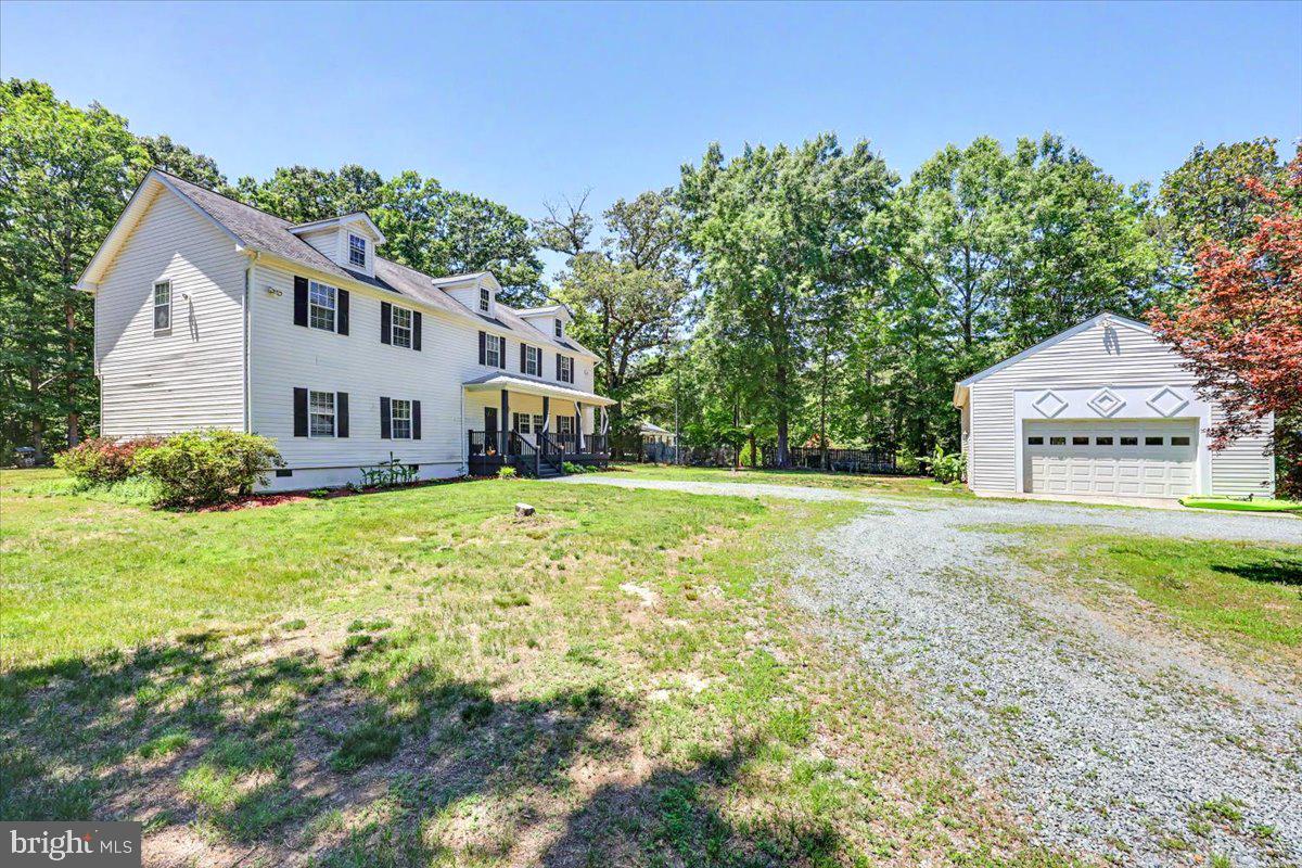 Nestled on 7.49 peaceful acres in the heart of Virginia countryside, this beautifully maintained 4-bedroom, 4-bath home offers the perfect blend of privacy, comfort, and convenience. Located less than 10 minutes from historic Gordonsville, approximately 15 minutes from Louisa and less than 30 minutes from Charlottesville, you'll enjoy a tranquil rural setting with easy access to shopping, dining, and everyday amenities. The area is known for its scenic countryside, charming small-town atmosphere, and convenient access to Central Virginia destinations. 2,970 square feet of living space, the thoughtfully designed open-concept floor plan creates an inviting atmosphere ideal for both everyday living and entertaining. The main level features spacious living areas along with generously sized bedrooms, while the upper level provides additional living and bedroom space, offering flexibility for guests, hobbies, or a home office. Outside, the property is a true retreat. Enjoy beautifully landscaped grounds, mature plantings, and plenty of room to roam, garden, or simply take in the peaceful surroundings. A detached one-car garage provides additional storage and workspace, while the charming chicken coop adds to the property's country appeal and homestead potential. Whether you're seeking a private family residence, hobby farm, or peaceful country getaway, this exceptional property offers the space, setting, and lifestyle you've been searching for.