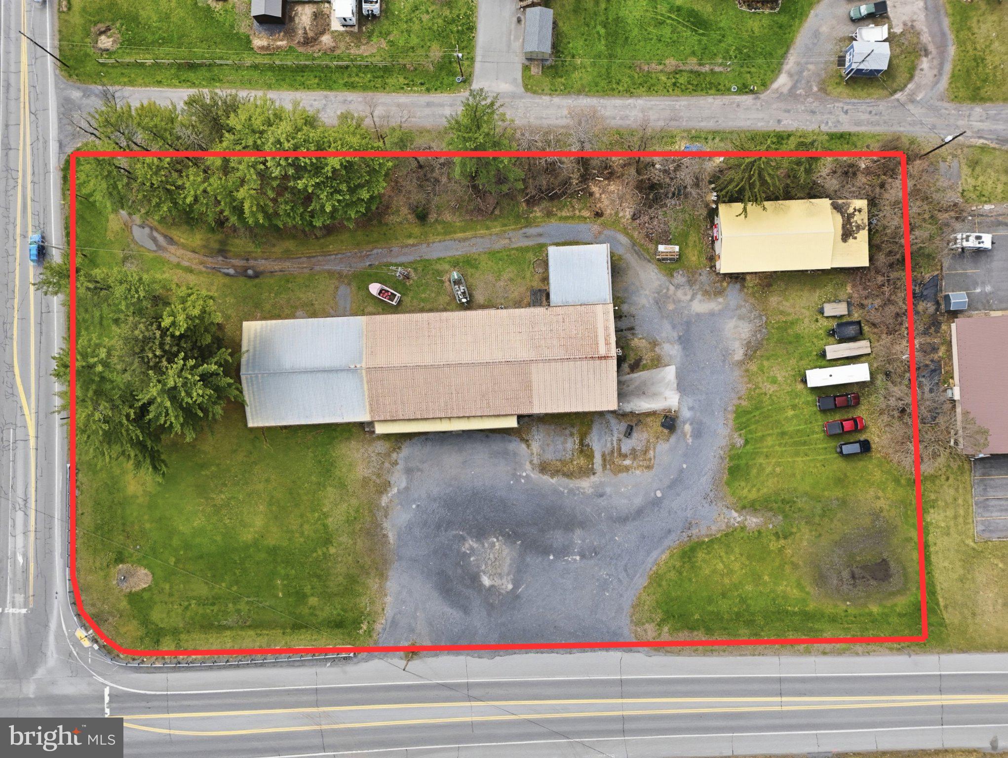 Location is everything in real estate, and this commercial opportunity in Mill Hall delivers. Welcome to 3250 Eagle Valley Road, a 2.4-acre property featuring a 9,700 square foot open-concept building plus an additional garage, offering the flexibility to accommodate a wide range of business ventures. Positioned just minutes from Lock Haven University, Central Mountain High School, and First Quality, and less than a minute from national retailers like Walmart, Weis Markets, Sheetz, and Lowe’s, this location benefits from steady traffic and strong consumer visibility. With direct access to U.S. Route 220 and close proximity to Interstate 80, customers from across Central Pennsylvania can reach you with ease.

As Mill Hall continues to grow, demand for retail, dining, and experience-driven businesses is rising while competition remains limited, making this an ideal opportunity for investors and entrepreneurs alike. Whether you envision a restaurant, brewery, retail center, fitness facility, medical or office space, event venue, or warehouse conversion, the possibilities here are wide open. If you’re seeking a high-visibility location with room to scale, this property is ready to deliver. Schedule your private showing today. Property is in an AE Flood Zone.