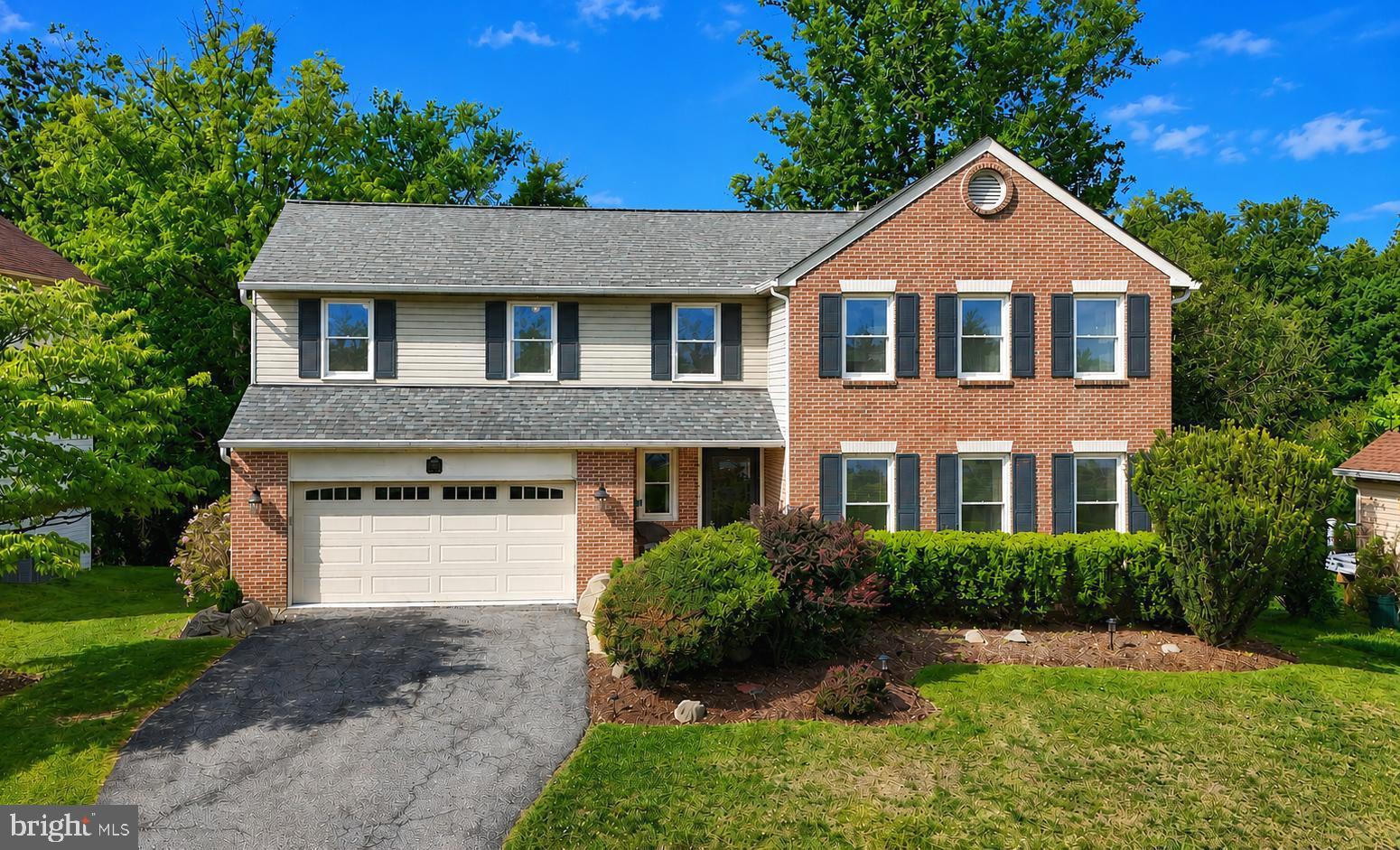 Welcome to 2108 Merrifields Dr, a beautiful brick front colonial in the highly sought after Gaywood Estates community. The covered front entrance leads into a welcoming foyer with hardwood floors, picture frame molding, a powder room and coat closet. The sunken living room, brightened by three large windows, features hardwood floors and crown molding. The formal dining room has recessed lights, hardwood floors, chair railing, crown molding, as well as a large window filling the room with natural light. Off the dining room is the beautifully renovated kitchen, complete with stainless steel appliances, granite countertops with a breakfast bar, recessed lighting, a walk-in pantry, hardwood floors, and an informal eating area overlooking the deck. The kitchen opens to the expansive family room with dramatic two story vaulted ceilings, three skylights, hardwood floors, a wood burning fireplace with a hearth, mantel, and decorative surround, and two sets of glass doors leading to the deck - perfect for entertaining. 

On the upper level, there are four spacious bedrooms. The primary bedroom has brand new carpeting, cathedral ceilings, a walk in closet, and three windows offering natural light. The primary bathroom features a ceramic tile surround walk-in shower, soaking tub, recessed lighting, ceramic tile flooring, dual sink vanity, and a skylight. Off the hallway, there is an additional full bathroom with ceramic tile flooring, a dual sink vanity, and a ceramic tile surround tub/shower. There is also a linen closet, as well as a walk-in closet with custom built-ins, in the hallway. 

The fully finished lower level features a recreation room with brand new carpeting on one side making a cozy TV area, and ceramic tile flooring on the other side - perfect for an exercise area or craft space. There is also a built in wet bar, recessed lighting, a convenient powder room, a laundry room with a utility sink and built-in storage shelving and cabinets, plus a flexible bonus room - perfect for a home office or additional bedroom. This level exits to the exterior patio, under the deck, as well as the backyard and fire pit. 

Gaywood Estates is a beautiful mature community with large homes on spacious lots. Neighbors gather several times a year at “The Triangle” for barbecues, the Halloween Parade, and the Garden Club plant and yard sale. Commuting is a breeze with quick access to the ICC and a 10 minute drive to the Glenmont Metro. Top public and private schools, Northwest Golf Course, Argyle Country Club, shopping centers and medical facilities are all a short drive from the neighborhood. 

(Roof - 2016) (HVAC - 2016) (Hot water heater- 2025) (Carpets replaced - 2026)