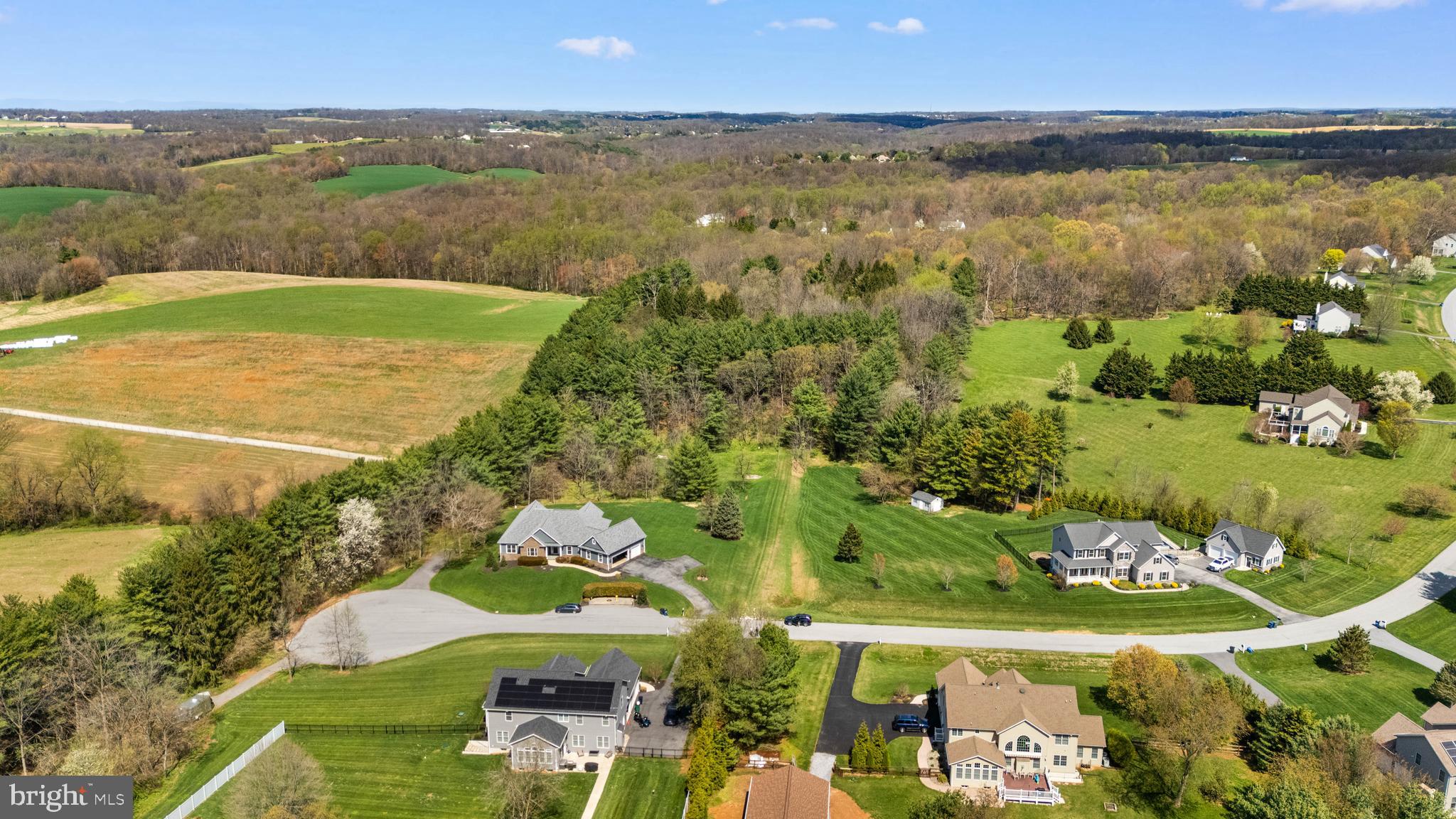 Build your dream home on this stunning 11-acre property with a rare combination of privacy and community access. Tucked away with a private driveway that connects to the desirable Harrison Hills subdivision in Woodbine, this lot offers the best of both worlds. Existing well, septic, and electric are already installed, saving time and cost. Bring your own builder or work with one of ours to create a fully customized home. Endless possibilities in a peaceful, scenic setting while still close to everyday conveniences.