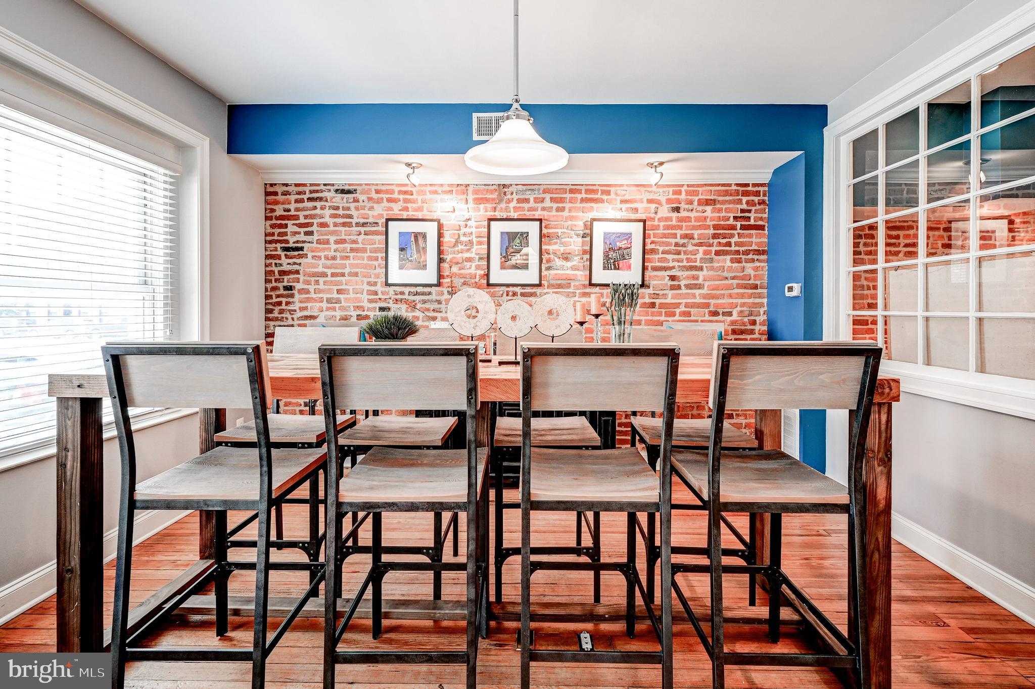 This spacious double wide, brick townhome office  would be an ideal space for an insurance, financial or retail space.  Live, Work and Play in the great neigbhood of Locust Point.  This woderful space includes all of the “Charm City" features like random plank floors, exposed brick and a back patio to enjoy lunch or take a break from a hectic day.   The first floor includes a welcoming seating area, Reception Desk, Conference Room adjacent to Two Offices, Powder Room and Kitchen.  The second floor has 4 private offices and one loft office, a full bath and a bright lounge area.  This bright space offers a glass roof lantern and allows light into the middle of the office and down the two-story opening to the first floor.  This wonderful space is located minutes from I-95, I-295 and the BWI Airport.  Tons of free parking around the building makes it easy to pop in and out.