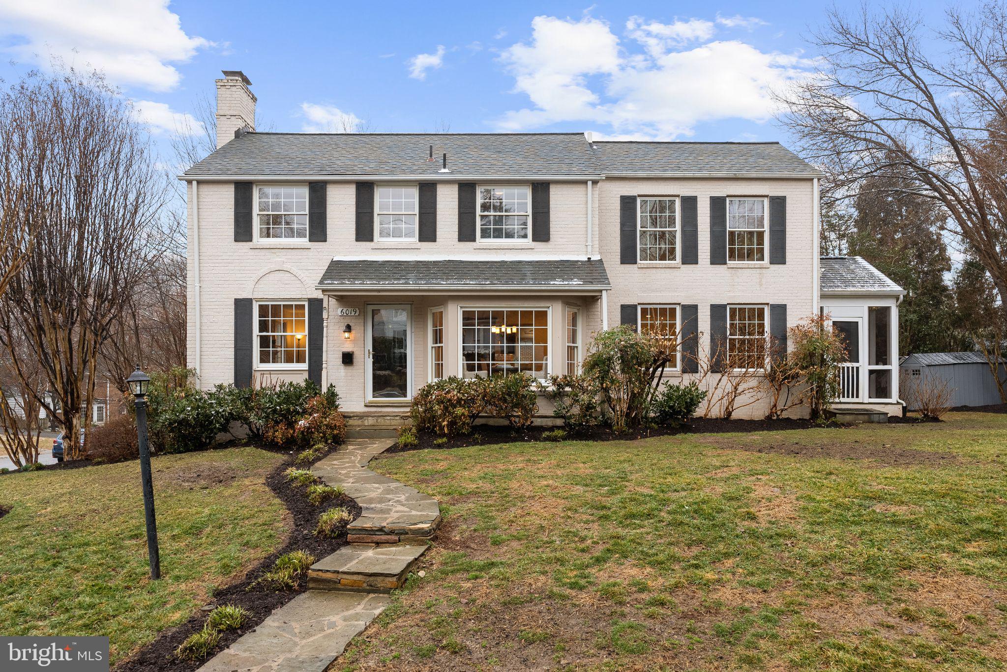 Welcome to 6019 Woodacres Drive, a true gem in the heart of Bethesda’s cherished Woodacres neighborhood! This classic center-hall Colonial, set gracefully on a sun-kissed corner lot, offers over 4,200 square feet of thoughtfully updated space that perfectly balances timeless elegance with modern functionality.

Step through the front door and be greeted by a warm, inviting living room anchored by a cozy fireplace—perfect for curling up on cool evenings. An expansive dining room awaits your next dinner party or holiday gathering, while the main-level office, complete with its own powder room, is ideal for remote work or quiet study sessions. The heart of the home, a beautifully renovated eat-in kitchen, is a chef’s paradise, featuring seamless flow into the spacious family room. Just beyond, a tranquil screened-in porch invites you to savor your morning coffee or relax on breezy summer nights. Rounding out the main level is a practical mudroom designed with convenience in mind.

Upstairs, you’ll find four sunlit bedrooms and three full bathrooms. The primary suite is a true retreat, boasting a spa-like bathroom and an oversized walk-in closet that dreams are made of. Gleaming hardwood floors and tasteful recessed lighting elevate the entire home.

Need more space? The lower level delivers! A versatile recreation room is ready to host movie nights, game nights, or workouts. You'll also find a laundry room, a second office space, a full bath, a legal bedroom, and a one-car side-entry garage—plenty of room for all your needs. Outside, the sunny yard is perfect for gardening, playing, or simply soaking in the peaceful surroundings.

This home’s location is just as remarkable as its design. It’s a short stroll to Woodacres Elementary School and its delightful playground, and only minutes from Westbard Shopping Center, Downtown Bethesda, and local hotspots like Millie’s. Plus, it’s served by the award-winning Whitman High, Pyle Middle, and Woodacres Elementary schools.

6019 Woodacres Drive isn’t just a house—it’s a place where memories are made and a lifestyle is embraced. Come experience it for yourself—you just might fall in love!