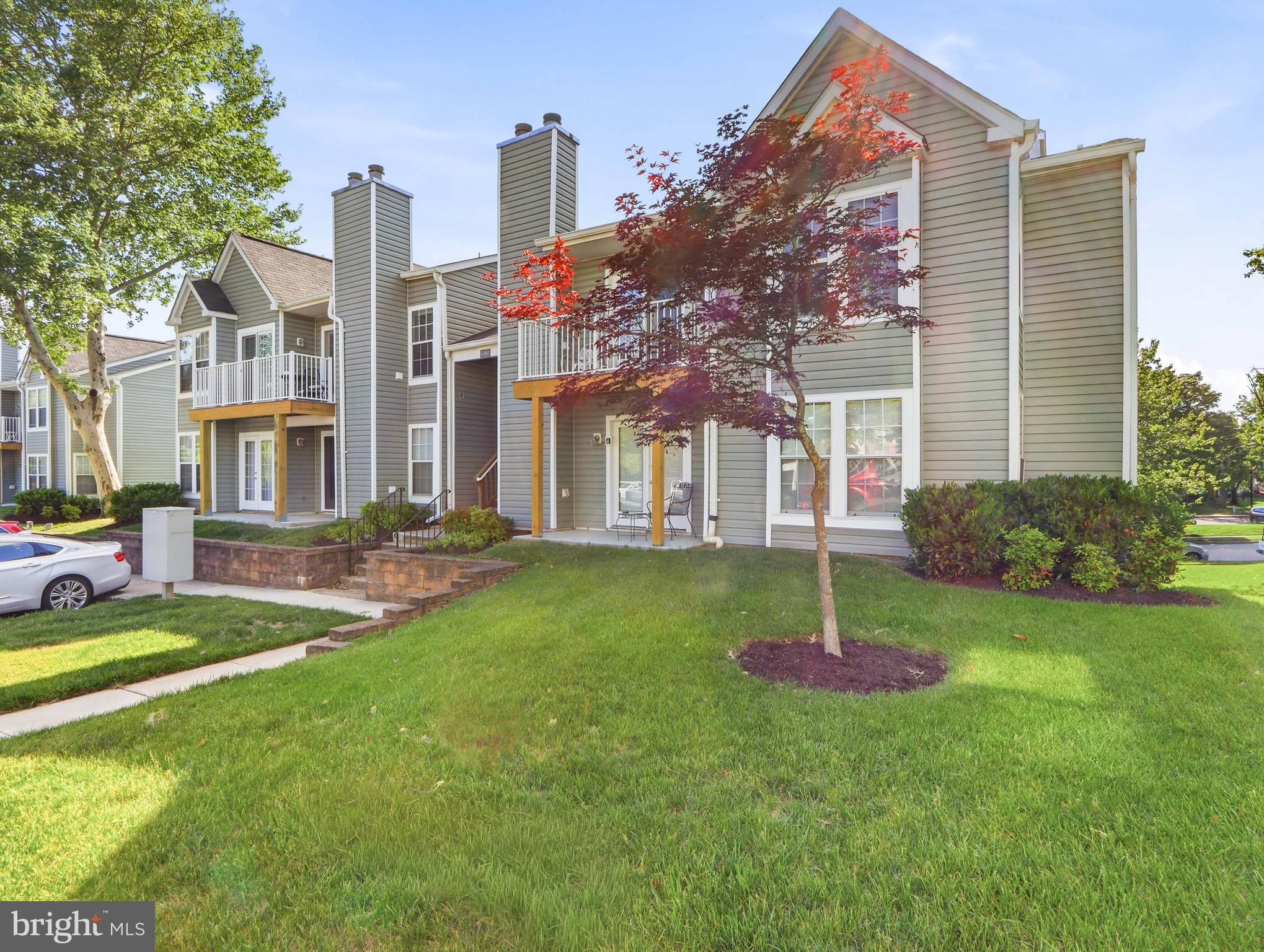 Charming main-level unit featuring 2 bedrooms and 1 full bath with stylish LVP flooring throughout. Open-concept layout with a spacious living and dining area, complete with a cozy fireplace and direct walk-out access to the porch area. Kitchen offers stainless steel appliances, and washer/dryer are included for added convenience. Comfortable and functional living all on one level!