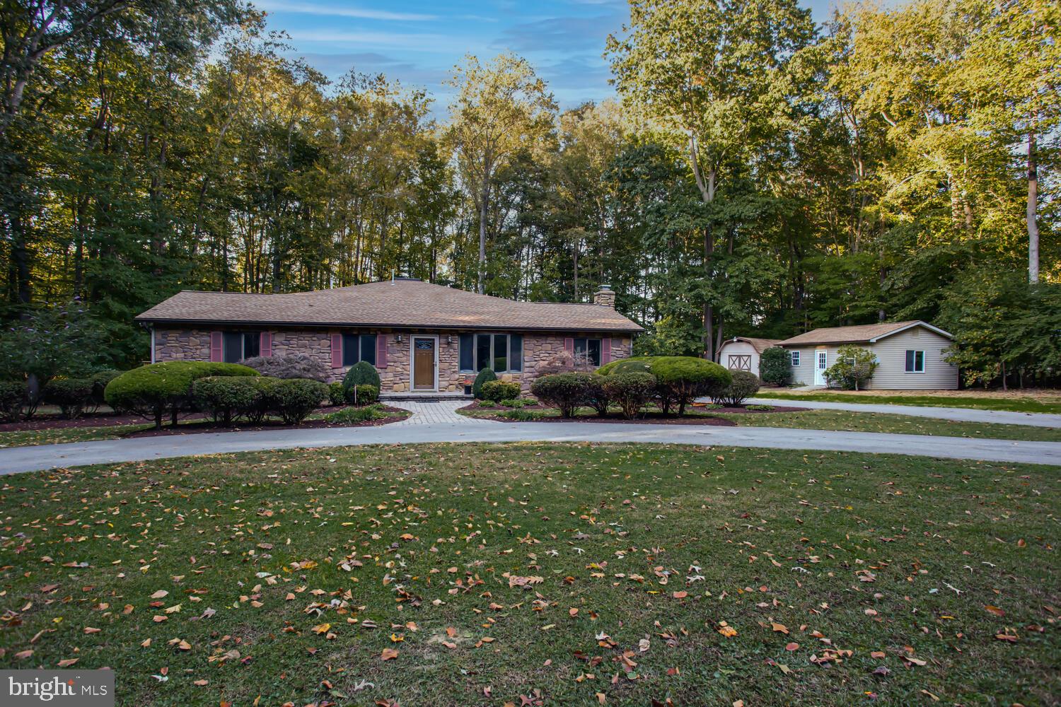 This large  well maintained rambler is sure to fit all of your needs!  Enjoy the privacy of being situated at the end of a dead-end street on over 2 & a half acres, but still being in a great commuter location with easy access to DC & VA!  This home is beautifully landscaped with a circular driveway and has plenty of space for parking.  Featuring 5 bedrooms, a loft which could be a potential 6th bedroom and 3 full baths!  A formal living room, a large kitchen with tons of cabinet space, a dining room with a fireplace and a huge family room with a second fireplace!  All of this on a partial basement with 2 more finished rooms!  This home is perfect for entertaining whether you are gathering inside or out!  Outside there are 2 large decks, with one off the back of the house and the other off the master bedroom.  A detached mancave, large storage sheds and a lean-to.  This home has all new paint  and flooring through out!!  You won't be disappointed!!