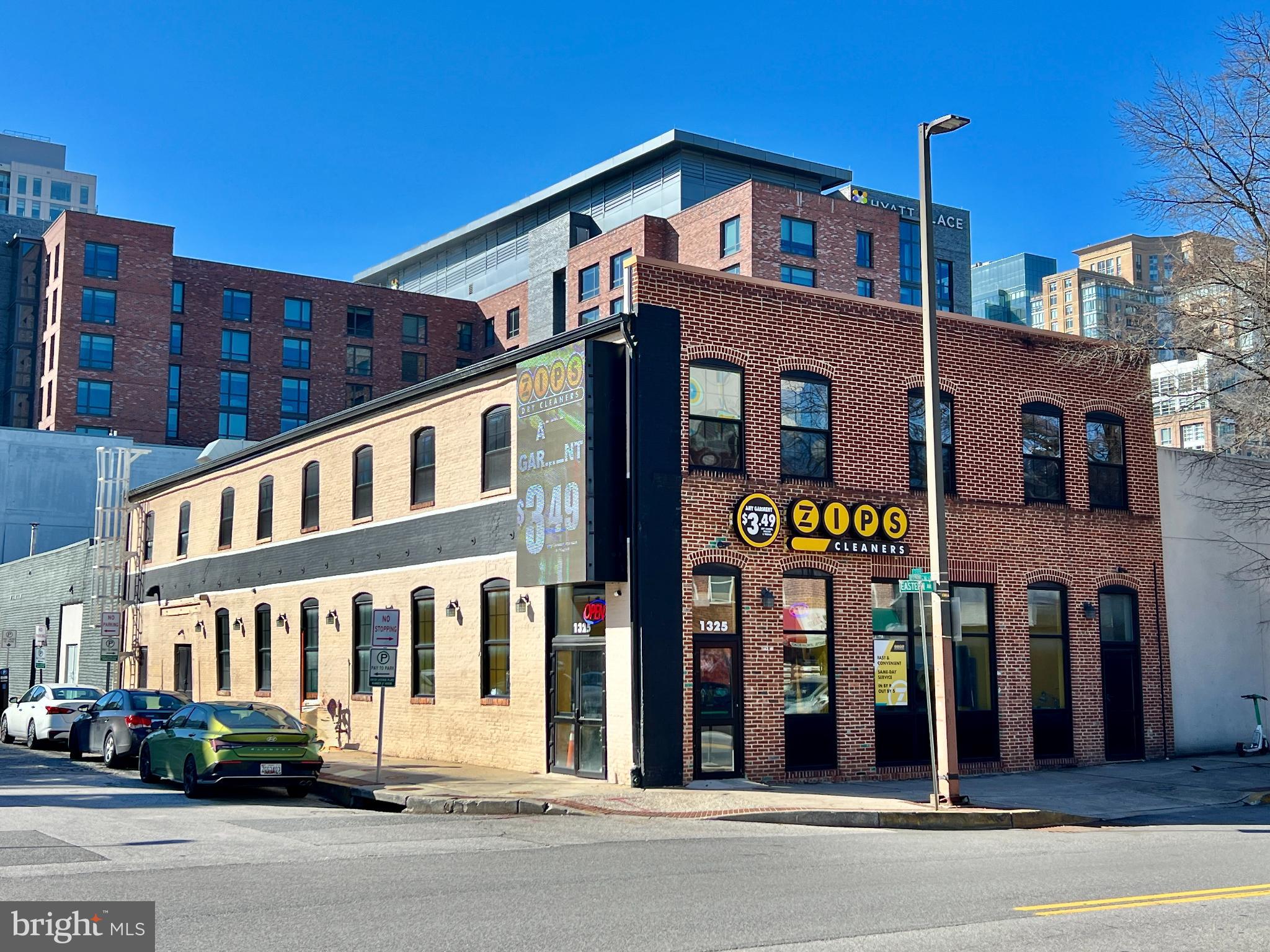 Welcome to 1325 Eastern Avenue! The property features 7,932 square feet of space over 2 floors. Full renovation occurred in 2016 when owner-user moved in: brand new concrete slab, windows, doors, roof, completely new mechanical, electric, plumbing, and fire safety. Structural work included installation of two (2) 8-foot structural walls and new footings. New front brick wall (facing Eastern Ave) and repointed the remaining brick walls. In addition, owner installed a steel ladder to give access to the roof. In 2023, owner installed StormMeister commercial grade flood proof doors for every ground level door. Leasing comps: $30 psf, NNN for ground level, and $25 psf, MG for upper level. Brexton Commercial can provide comps upon request. PRO-FORMA NOI is $172,000.

INTERIOR DESCRIPTION:
1st Floor: Currently operating as Zips Cleaners. Approximately 3,966 square feet of retail space. The space features check-out counter, garment conveyor belt system, ADA changing room, ADA restroom, open work space, sprinkler room, electrical room, and energy efficient plumbing and electrical. The space also features two (2) tankless water heaters and three (3) electrical panels. PLEASE NOTE: Zips has not dry cleaned clothes in this location since 2020. Owners can provide a clean Phase I & Phase II upon lender request.

2nd Floor: Beautiful industrial style loft space with entrance on Eastern Ave. The windows line the eastern wall of the premises, which provide pleasant natural morning light. The space features brick that has been beaufully repointed, and black trim which accent the space very well. In addition to the quintessential charm of the brick, the space also features historic industrial features, such as a "gear" and "wheel" from the me of its original construction. The mechanicals for the space are as follows: (i) sprinkler system with heads turned up (ii) 120/208 V, 125 amp electrical panel, separately metered (iii) incandescent lighting fixtures (iv) plywood floors and
reinforced structure (v) wired space heaters.