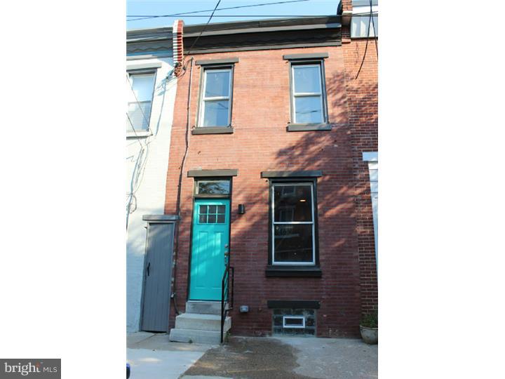 This Fishtown beauty has been completely remodeled from top to bottom starting with all new electrical, plumbing, & heating systems. Enter into living with exposed brick and recessed lighting. There are refinished original pine flooring throughout the home. The kitchen features custom cabinets, stainless steel appliances including a dishwasher, over the range microwave, & gorgeous granite counters. The 2nd floor features 2 spacious bedrooms both of which have ample closet space. There is a full 3 Piece bathroom with heated floors. Partially finished basement (bonus room) w high ceilings. Central air unit will definitely keep you cool on those hot summer days. Home also features custom made railing, private yard, powder room and laundry room on 1st floor. This one truly is a must see. Known as the Ghost Sign House on Philly Curbed.