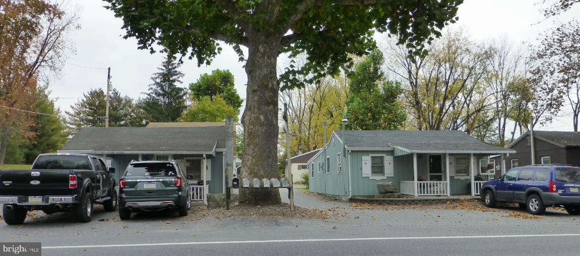 Five separate houses (all 1 story) all currently rented, 2-story garage with 2 garage bottom level w/workshop upper level, maintenance on all units has been kept up to date each year. All units rented m/m - Possible $350 month rent on garage.
