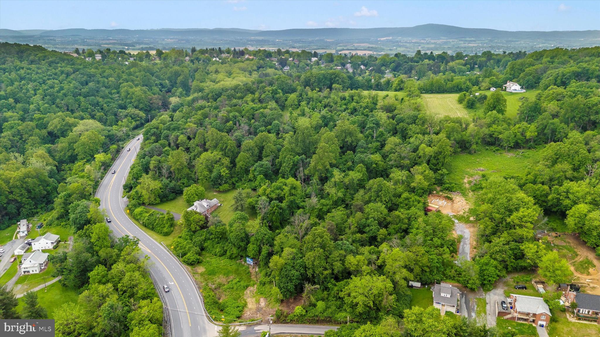 5.8 acre lot on corner of Edgemont Rd & Old National Pike. The property is a U shaped lot. This property will have access to public water from Edgemont Rd. The property does not have a septic, and is on restricted soil. The lot is mostly wooded but there is plenty of flat area to build your dream home. Great location close to shopping, restaurants and major highways.