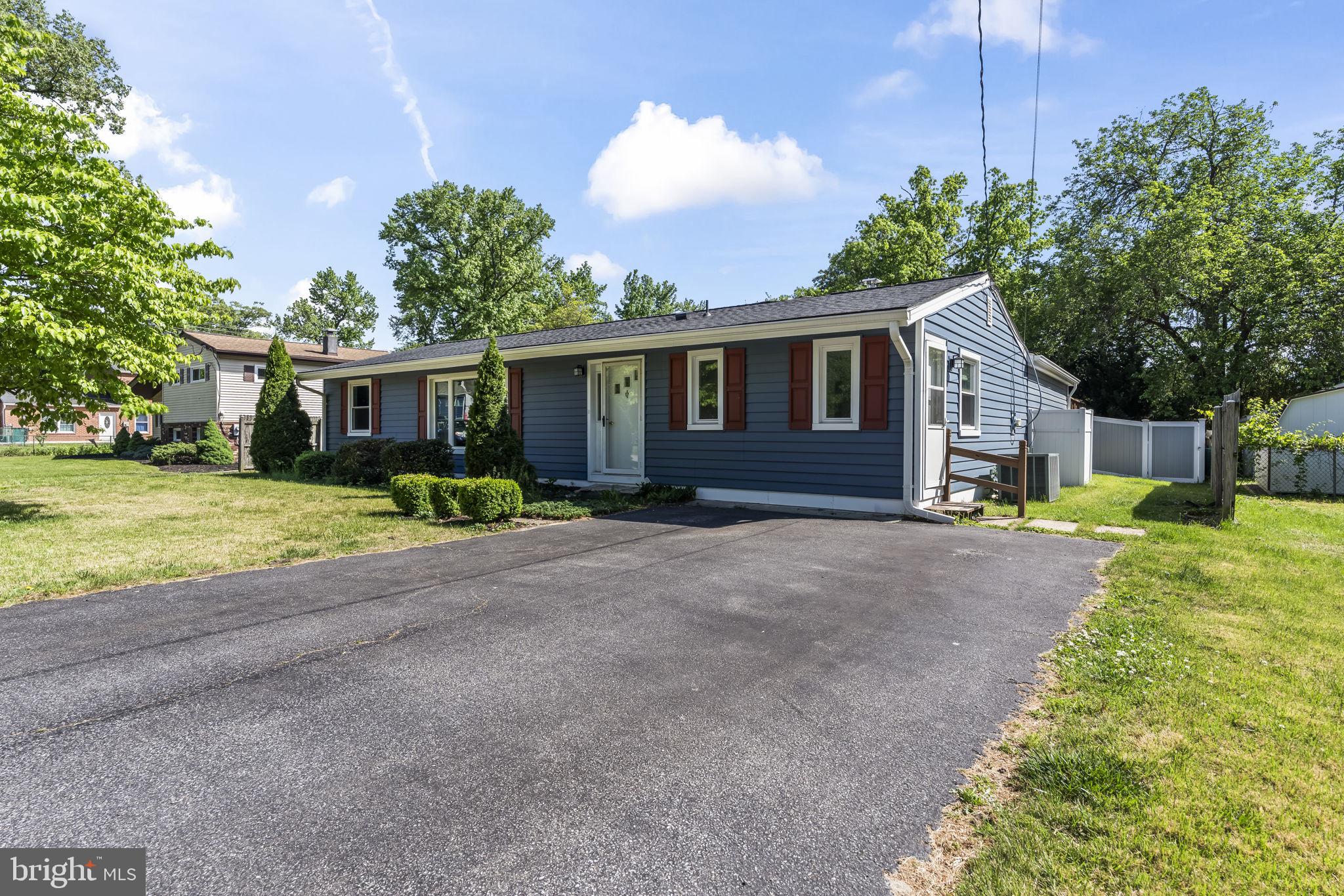 ASSUMABLE VA LOAN FOR A QUALIFIED VA BUYER! 5.25% 
This 3-bedroom (possibly 4) 2-bath rambler sits on one of those private lots that just feels right the moment you pull up. And the best part? All the big-ticket stuff is already done! Freshly painted,  new roof, new windows, new siding, and shutters, so you're not inheriting someone else's to-do list. They even encapsulated the crawlspace and added a dehumidifier and it's still under warranty! Inside, you'll find  a massive mudroom off the kitchen that'll quickly become the most used room in the house. Somewhere to toss the backpacks, kick off the boots, and take a breath before dinner.  There is a huge rec room off the back of the house and has a sunken conversation pit with a fireplace right in the center. It's the kind of room that makes you want to have people over. Game days, movie nights, or just mixing a drink and sinking into that conversation pit by the fire. Friends will never want to leave. There's also a full bath attached and an office, so if you'd rather turn this whole space into a giant owner's suite, you absolutely could. The backyard is flat, usable, and bigger than you'd expect. Great for a garden, a pool, entertaining, or just relaxing in the sun. There's even a double fence setup. One area is for hanging out and enjoying your evening and the other area for the pets! Keeping everything clean and separate! The perfect location and convenient to shopping and amenities! An easy drive to Baltimore, Annapolis, and DC!