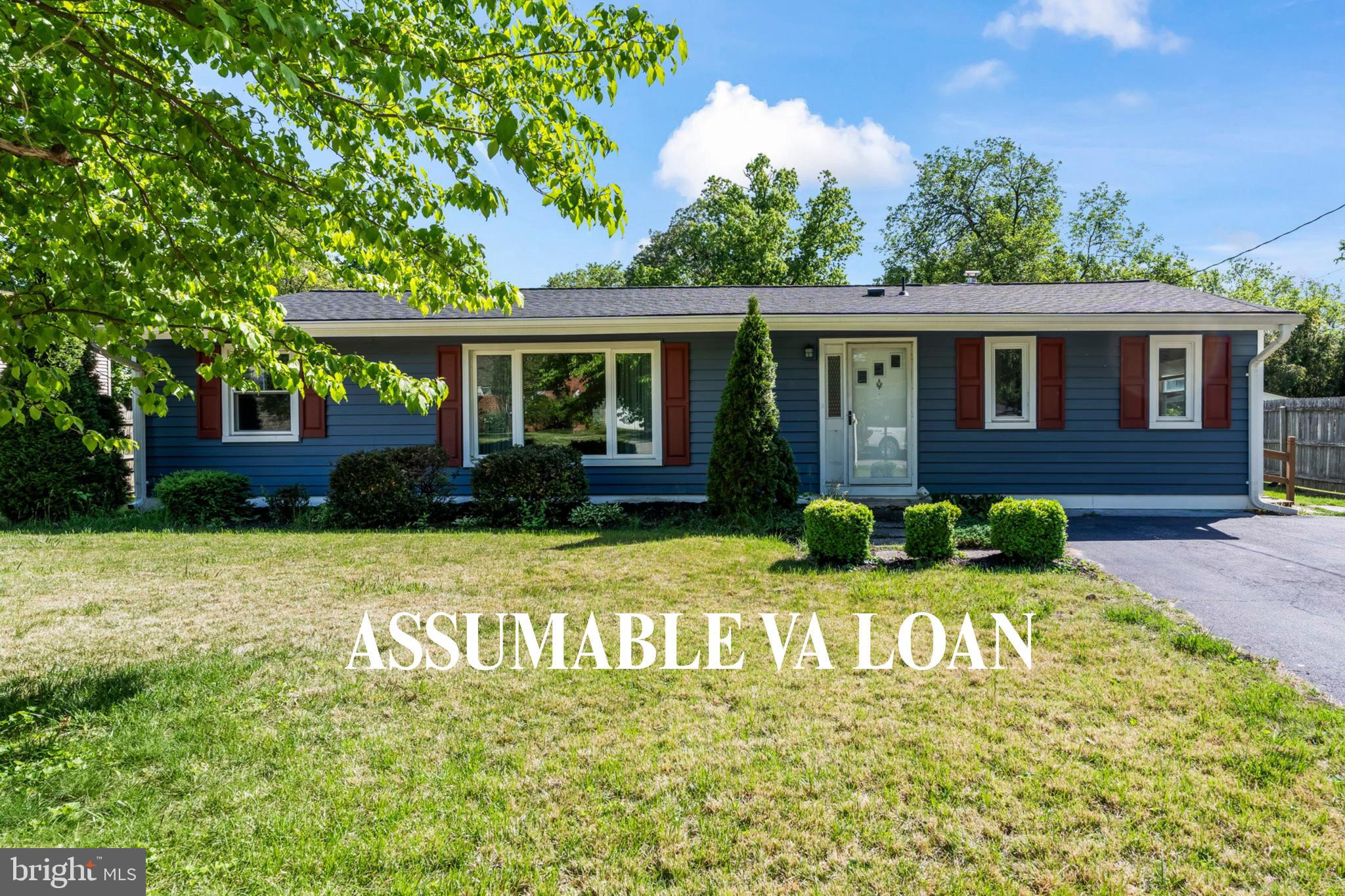 ASSUMABLE VA LOAN FOR A QUALIFIED VA BUYER! 5.25% 
This 3-bedroom (possibly 4) 2-bath rambler sits on one of those private lots that just feels right the moment you pull up. And the best part? All the big-ticket stuff is already done!  New roof, new windows, new siding, and shutters, so you're not inheriting someone else's to-do list. They even encapsulated the crawlspace and added a dehumidifier and it's still under warranty! Inside, you'll find  a massive mudroom off the kitchen that'll quickly become the most used room in the house. Somewhere to toss the backpacks, kick off the boots, and take a breath before dinner.  There is a huge rec room off the back of the house and has a sunken conversation pit with a fireplace right in the center. It's the kind of room that makes you want to have people over. Game days, movie nights, or just mixing a drink and sinking into that conversation pit by the fire. Friends will never want to leave. There's also a full bath attached and an office, so if you'd rather turn this whole space into a giant owner's suite, you absolutely could. The backyard is flat, usable, and bigger than you'd expect. Great for a garden, a pool, entertaining, or just relaxing in the sun. There's even a double fence setup. One area is for hanging out and enjoying your evening and the other area for the pets! Keeping everything clean and separate! The perfect location and convenient to shopping and amenities! An easy drive to Baltimore, Annapolis, and DC!