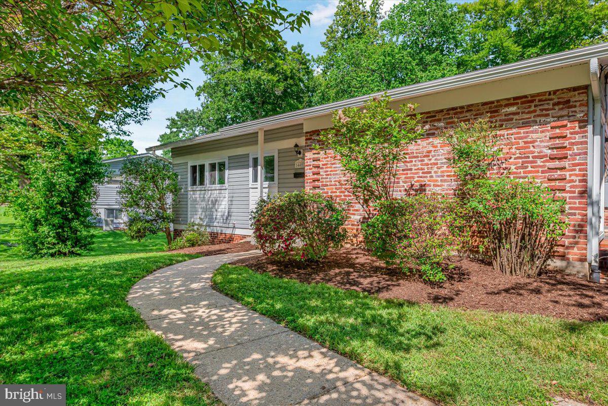 Second chance.  Buyer got cold feet.  Welcome to 14407 Briarwood Terrace, a beautifully updated 4-bedroom, 3-bath rambler in the Manor Woods community of Rockville. For those who love nature, the home backs to Sycamore Creek and features a spacious, lush backyard, offering a peaceful blend of privacy, comfort, and convenience.

The sun-filled main level features refinished white oak hardwood floors, crown molding, recessed lighting, and an oversized bow window overlooking the serene yard. The spacious kitchen features quartz countertops, a new backsplash, ample pantry storage, and a bright breakfast area perfect for everyday living.

The spacious primary bedroom includes an updated en-suite bath, while two additional bedrooms offer peaceful views and large closets. The walkout lower level features a recreation room with a brick wood-burning fireplace, an additional guest suite with a bedroom, full bath, and a versatile home office or fitness space.

Convenient to Rock Creek Park trails, Glenmont and Rockville Metro stations, shopping, dining, parks, and commuter routes, this move-in-ready home also includes a private driveway for off-street parking.