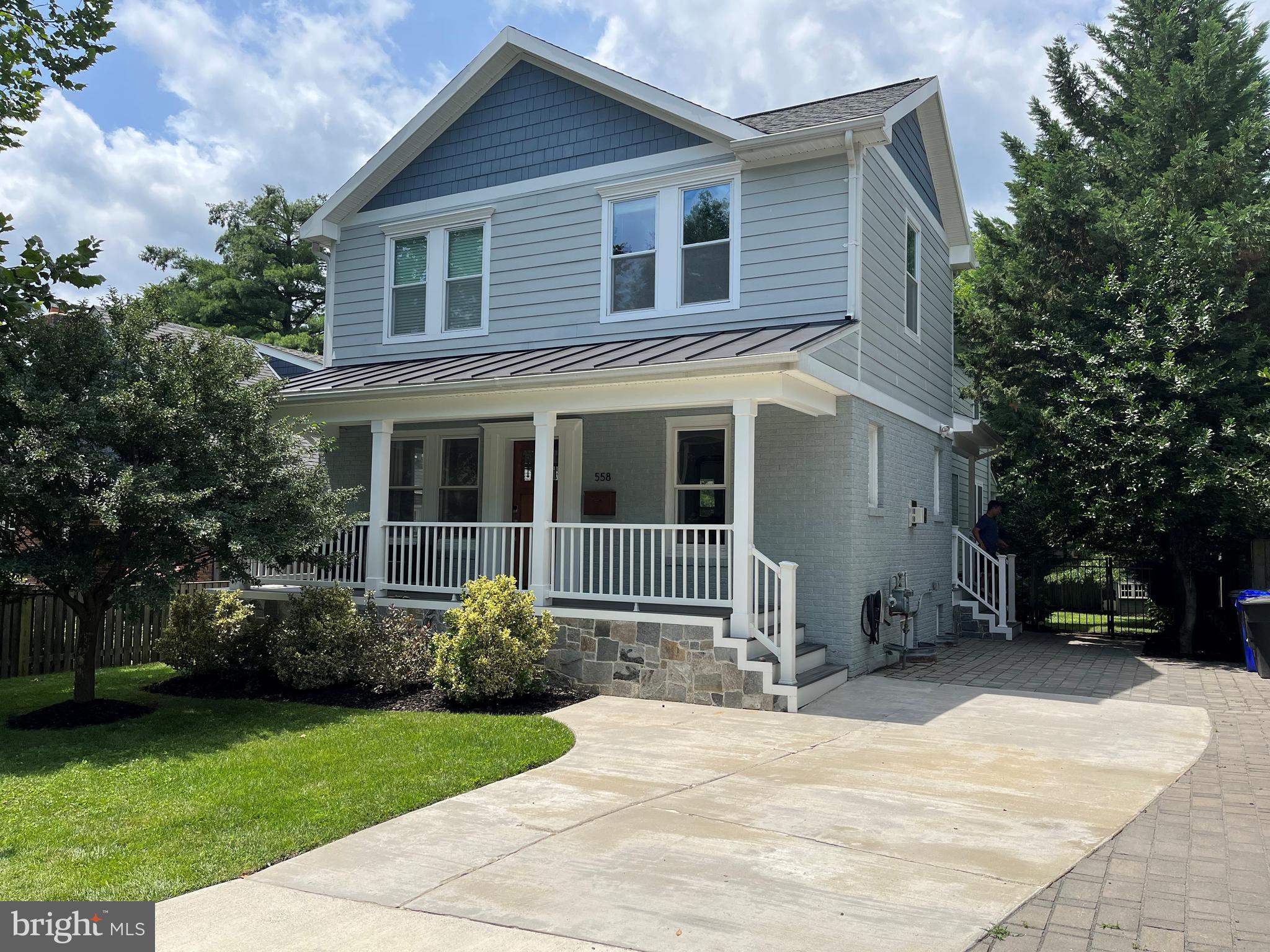 **Substantially expanded and renovated since 2015, this home now offers a bright, open interior with thoughtful details and fine finishes.**Enter through an inviting front porch to a large living room anchored by a fireplace and with space for several seating areas. The living room flows into the dining room and the adjoining butler's pantry, featuring glass front cabinets and quartz tops.**The kitchen has crisp white cabinets, quartz countertops, and stainless appliances.** A built-in banquette provides seating in the breakfast areas.   The family room has areas for media and play and opens to the back porch, patio, and well-landscaped yard.**Two deep  closets provide good storage in the mudroom which opens to the side porch and driveway -- so convenient for bringing groceries and packages directly into the home.** A powder room is well placed off the mudroom**Upstairs, the primary bedroom has space for  a desk or seating area and a fitted walk in closet** An oversized shower, double vanity, and classic details distinguish the primary bathroom.**Three more bedrooms with vaulted ceilings are on this floor along with a renovated hall bathroom.** The laundry room is conveniently located upstairs, too**In the lower level, the well proportioned rec room has areas for media, play, or an office along with a  door to the side yard**The  private fifth bedroom has a large closet with built-in drawers and organizers and a bright window**Large exercise equipment can be accommodated in the gym, and a rubber floor ensure comfortable workouts**Most convenient location less than a half mile to  Virginia  Square Metro and walkable to shops, restaurants, and services in the Courthouse/Clarendon/Ballston neighborhoods. **A few blocks to tennis courts and playground and near the bike trail**Easy commute to Washington, Rosslyn-Ballston business corridor,  Amazon HQ2 at  National Landing/Pentagon City/Crystal City, Fort Myer/Henderson Hall, Pentagon, Foreign Service Institute, and Army Readiness Center.**People working from can take a break with a walk for coffee through the leafy streets of Ashton Heights.**A pristine home with stylish details and an enviable location**