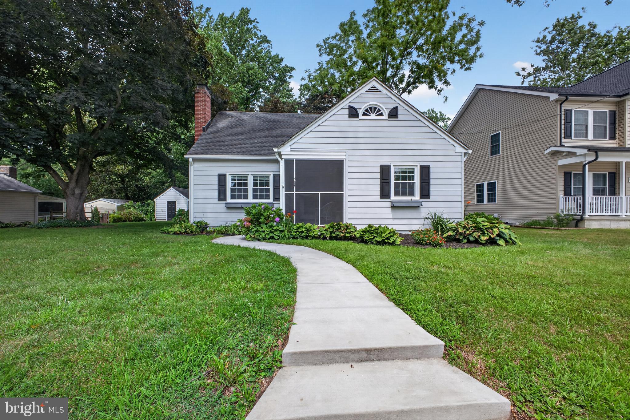 Welcome to 213 Elm Street in Centreville. Be Sure to Click the Virtual Tour!! This property has been meticulously cared for by the current owners, and it shows! The property sits on .23 acres. Pride of ownership shines through in this gem of a home. This property gives you plenty of space both inside and out. You will be welcomed home every day by your screened in, front porch and its classic brick floor. There is hardwood flooring throughout the first and second floor. The living room includes a wood burning fireplace that was serviced and repaired in 2024 and has worked beautifully since. The property backs up to a nice, wooded area with plenty of peace and quiet. Enjoy tons of natural light in the spacious kitchen where granite countertops are partnered with a modern backsplash, Refrigerator, built-in microwave and stove. This home has three spacious bedrooms, 1 full and recently updated bathroom and an additional half-bathroom upstairs. The second floor could serve as a spacious owner’s suite with its very own sitting room, walk-in closet, updated half-bath and bedroom. The sitting area upstairs comes with custom-made built-in shelving. The unfinished lower level provides you with even more space for storage or it can be your very own blank canvas to finish and increase your living space. The laundry area is on the main floor, and the washer and dryer will stay with the home. The roof was replaced in 2020. The deck was updated and stained in 2025. The storage shed stays with the property, which has even more space. High Speed Talkie internet is available. It is in the town of Centreville, and it is minutes away from local shops. This is an Amazing Home!  It is turn-key and ready to Welcome its New Owners.