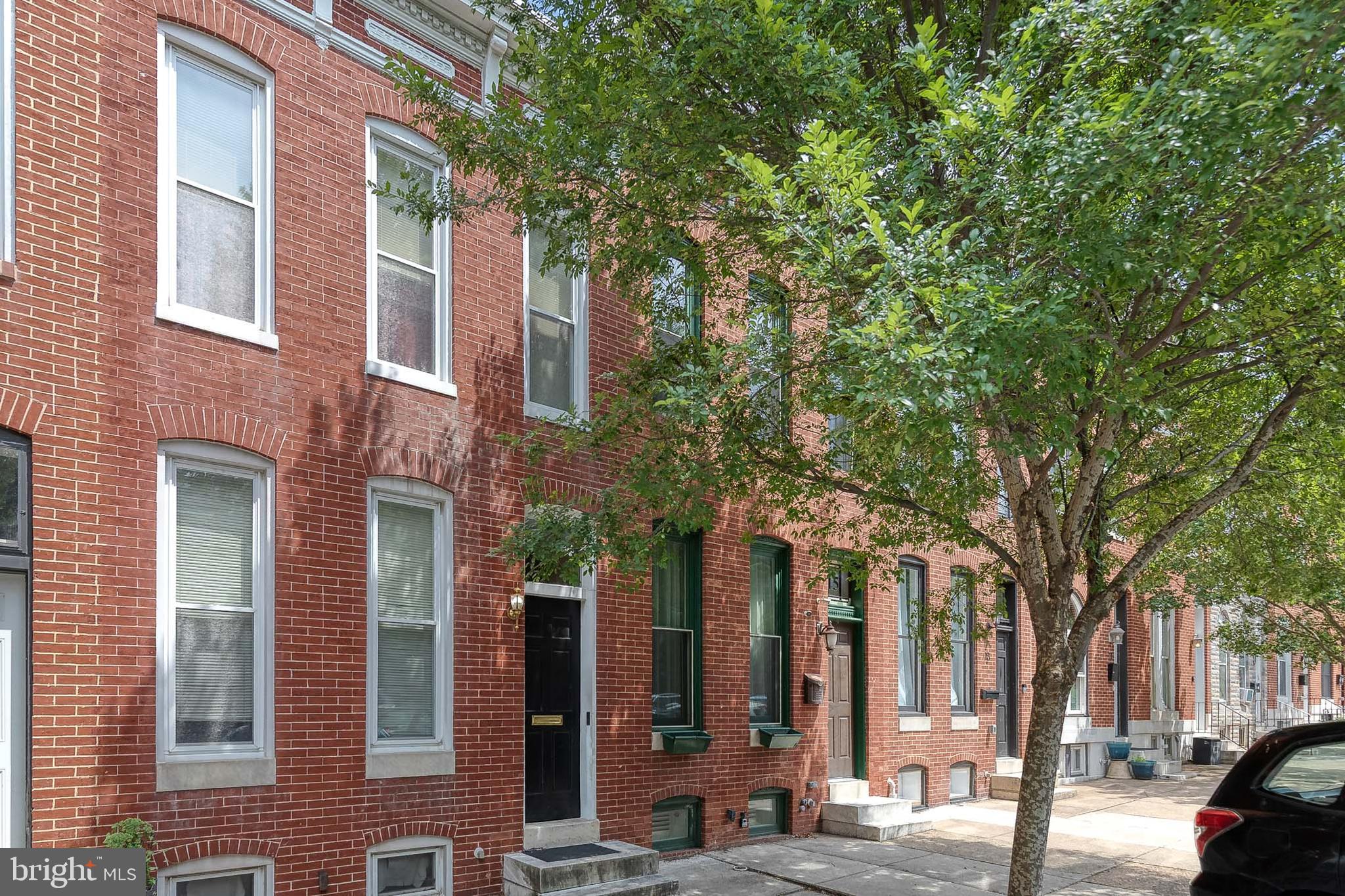 Charming brick rowhome in Canton right off Patterson Park, featuring beautiful hardwood floors, high ceilings, exposed brick, decorative fireplaces, and timeless character throughout. 

The spacious kitchen offers plenty of counter space, updated cabinetry, and access to the rear fully fenced patio. Kitchen opens up to a large dining room with plenty room to host. Main floor also has a convenient main-level half bath.

Upstairs, you’ll find two bedrooms, two full bathrooms, and stacked laundry. The finished lower level with carpeting and recessed lighting provides additional living space, perfect for a family room, home office, or gym. 

Ideally located near Canton Square, Patterson Park, shopping, dining, and commuter routes.