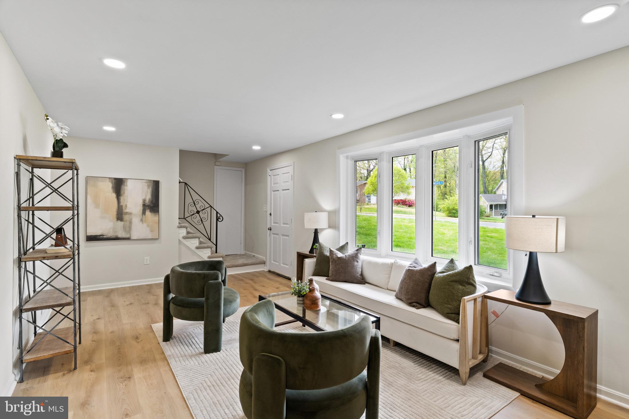 **OPEN HOUSE 8/1: 12-2PM. Welcome home to this beautifully updated 3 story Cape Cod in the highly sought-after Kings Park West community. Nestled on a corner lot, with over 2,500 sq ft, this move in ready home blends charm, comfort, and modern upgrades, while offering the perfect space for both everyday living and entertaining.
The updated kitchen features gas cooking, brand new stainless steel appliances, new countertops, and stylish cabinetry. The light-filled living room creates a warm and inviting atmosphere. The spacious primary bedroom is a true retreat, complete with a sitting area and abundant natural light.
Enjoy year-round relaxation in the large sunroom, which opens to an impressive two-level deck, perfect for outdoor seating, grilling, and hosting gatherings. Upstairs, you’ll find three well-sized bedrooms and a beautifully updated hall bathroom. The large basement offers flexible space ideal for entertaining, a home gym, or additional living areas.
Additional upgrades include new roof, gutters & siding installed in 2024, a new furnace installed in 2022, new flooring throughout (carpet and LVP), fresh paint and two updated bathrooms. 
Conveniently located with quick access to Metro bus routes and the VRE, commuting is a breeze. With thoughtful updates, versatile living space, and a prime location, this home truly has it all. Don’t miss your opportunity to make it yours.