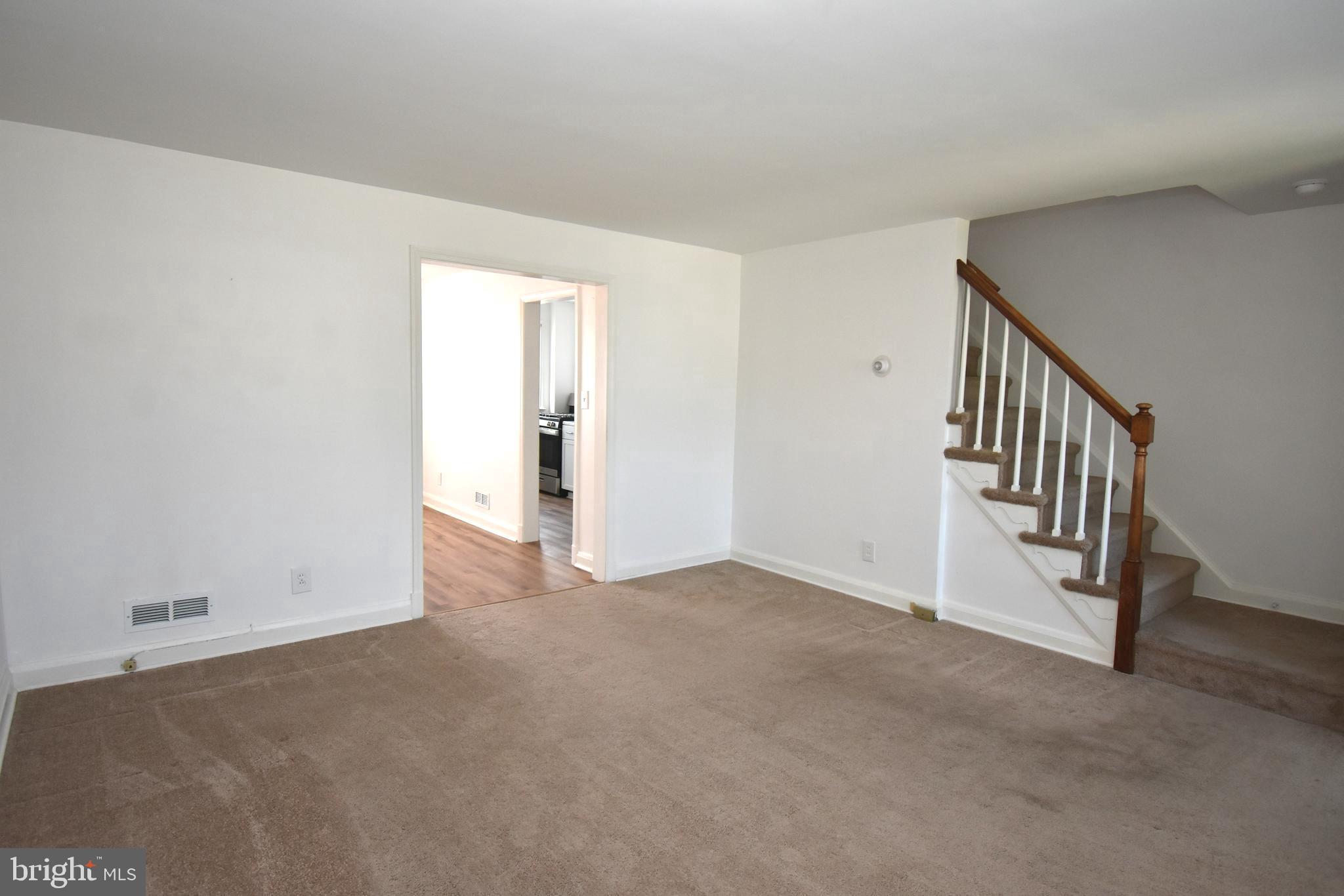 PRICE REDUCTION! SELLER MOTIVATED & WILL ENTERTAIN ALL REASONABLE OFFERS!  BRAND NEW ELECTRIC THROUGHOUT! BRING US AN OFFER! Pride of Ownership shines throughout this 3 BR 1 Full and 1 Half Bath Townhome! Main Level offers a spacious living room, dining room with new vinyl plank flooring, New Andersen screen door with pull down screen. Recently updated kitchen offers newer cabinets and appliances, along with an exterior door leading to the Trex deck, yard and car port. Lower Level offers new carpet and recessed lighting in the family room/game room.  Updated 1/2 bath in lower-level utility room which also offers new vinyl flooring.  Upper level offers 3 bedrooms and hall full bath.  Enjoy the convenience of rear off street parking carport. Close proximity to shopping, dining, parks, major highways and more!  Ground Rent $96.00 Annually - Paid in 2 Installments of $48.00 (January & July). Schedule a showing!