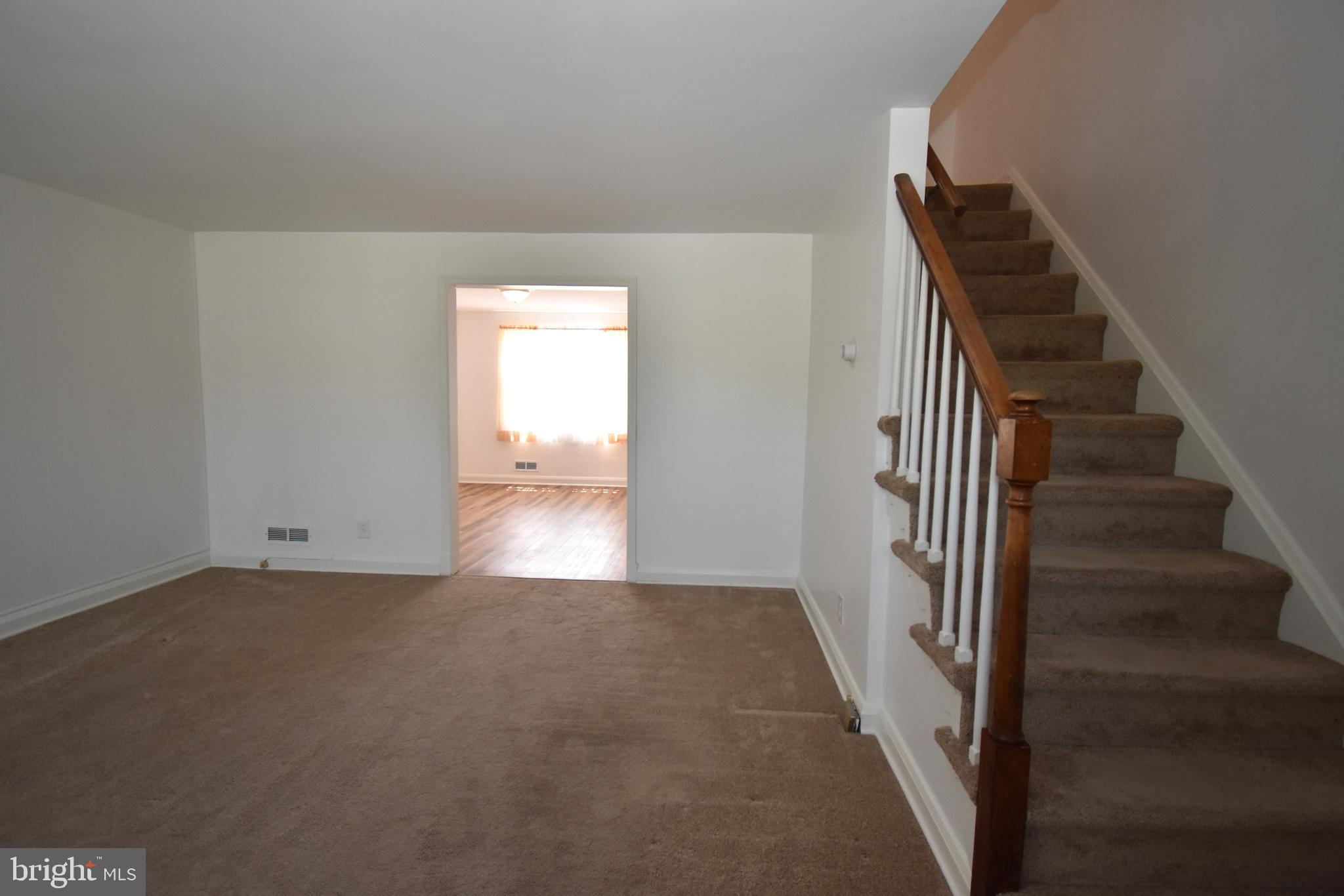 SELLER MOTIVATED!  BRAND NEW ELECTRIC THROUGHOUT! BRING US AN OFFER! Pride of Ownership shines throughout this 3 BR 1 Full and 1 Half Bath Townhome! Main Level offers a spacious living room, dining room with new vinyl plank flooring, New Andersen screen door with pull down screen. Recently updated kitchen offers newer cabinets and appliances, along with an exterior door leading to the Trex deck, yard and car port. Lower Level offers new carpet and recessed lighting in the family room/game room.  Updated 1/2 bath in lower-level utility room which also offers new vinyl flooring.  Upper level offers 3 bedrooms and hall full bath.  Enjoy the convenience of rear off street parking carport. Close proximity to shopping, dining, parks, major highways and more!  Ground Rent $96.00 Annually - Paid in 2 Installments of $48.00 (January & July). Schedule a showing!