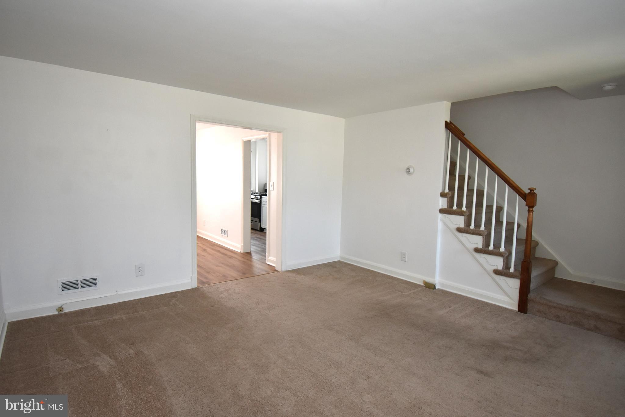 SELLER MOTIVATED!  BRAND NEW ELECTRIC THROUGHOUT! BRING US AN OFFER! Pride of Ownership shines throughout this 3 BR 1 Full and 1 Half Bath Townhome! Main Level offers a spacious living room, dining room with new vinyl plank flooring, New Andersen screen door with pull down screen. Recently updated kitchen offers newer cabinets and appliances, along with an exterior door leading to the Trex deck, yard and car port. Lower Level offers new carpet and recessed lighting in the family room/game room.  Updated 1/2 bath in lower-level utility room which also offers new vinyl flooring.  Upper level offers 3 bedrooms and hall full bath.  Enjoy the convenience of rear off street parking carport. Close proximity to shopping, dining, parks, major highways and more!  Ground Rent $96.00 Annually - Paid in 2 Installments of $48.00 (January & July). Schedule a showing!