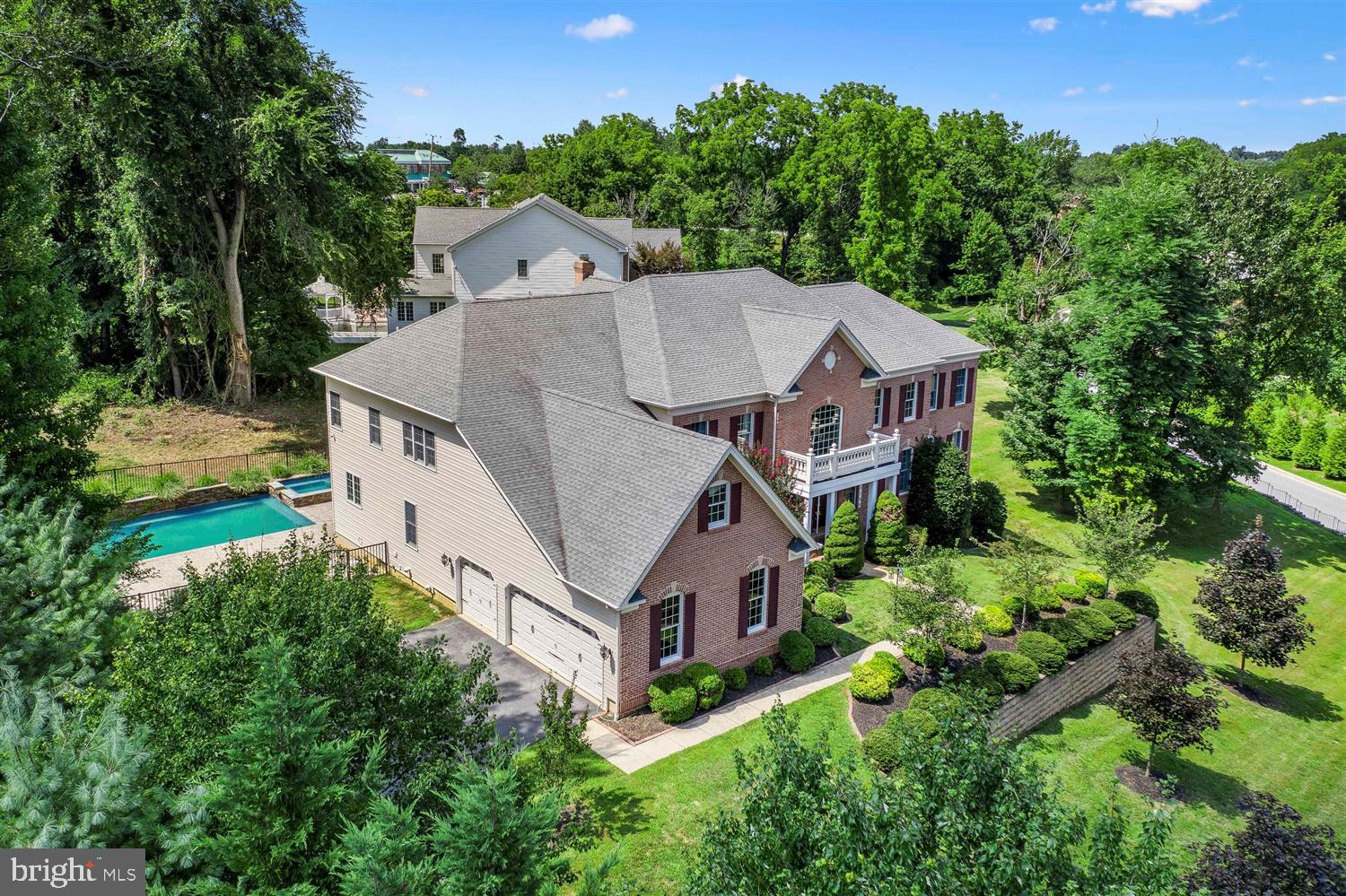 Truly remarkable, beautifully landscaped luxury home in Hunt Valley Chase! This stunning colonial home with over 9000 sq ft of living space has it all! Walk in and be greeted by a grand foyer with tons of natural light and dual staircase. As you continue, you will come through a formal dining room for all your entertainment dining, formal living room with access to a well lit sun room and a separate office. The gourmet kitchen is a chef's dream! With its large island, 36" cabinets, granite counter top, tile back splash and access to rear patio, it will be the focal part of the home! The 19 ft ceiling family room off the kitchen offers wood burning fireplace and wall full of large windows to allow natural light to flow throughout the main level. As you make your way upstairs, you'll admire the spacious bedrooms. Each bedroom completed with wall to wall carpeting also includes their own walk-in closet, sitting rooms and full bathroom. The master bedroom en suite is truly outstanding. With its own sitting area, spacious bedroom, master bathroom with soaking tub and separate shower, his and her sinks & multiple walk-in closets, it'll be more than what you dream of - especially the massive walk in closet in the bathroom. When you think that's all there is to see, you make your way to the finished lower level which was completed in 2017. This level is anyone's dream entertaining area! Find yourself in a large recreation room with a wet bar with its own full refrigerator and sink, a dry bar with built-ins for wine as well as a wine refrigerator, and a media room perfect for nights in watching movies. It doesn't end there. You will then find a full in law suite with its own living room, dining room, kitchen, bedroom and full bathroom! The home features all Nest integrated door lucks, fire alarms, thermostat, brand new whole house water system for filtration, tankless water system, new HVAC units for the home and updated duct work, and constant water pressure system. It doesn't end there. Walk out to your rear oasis! With paver patio, trek deck, and fire pit, it'll be a great spot for all seasons. Even more, a personal in-ground connected salt water pool with waterfall features, spillover, pool heat, spa heat, and lights, all controlled from your phone! Schedule your showing today! A true must see.