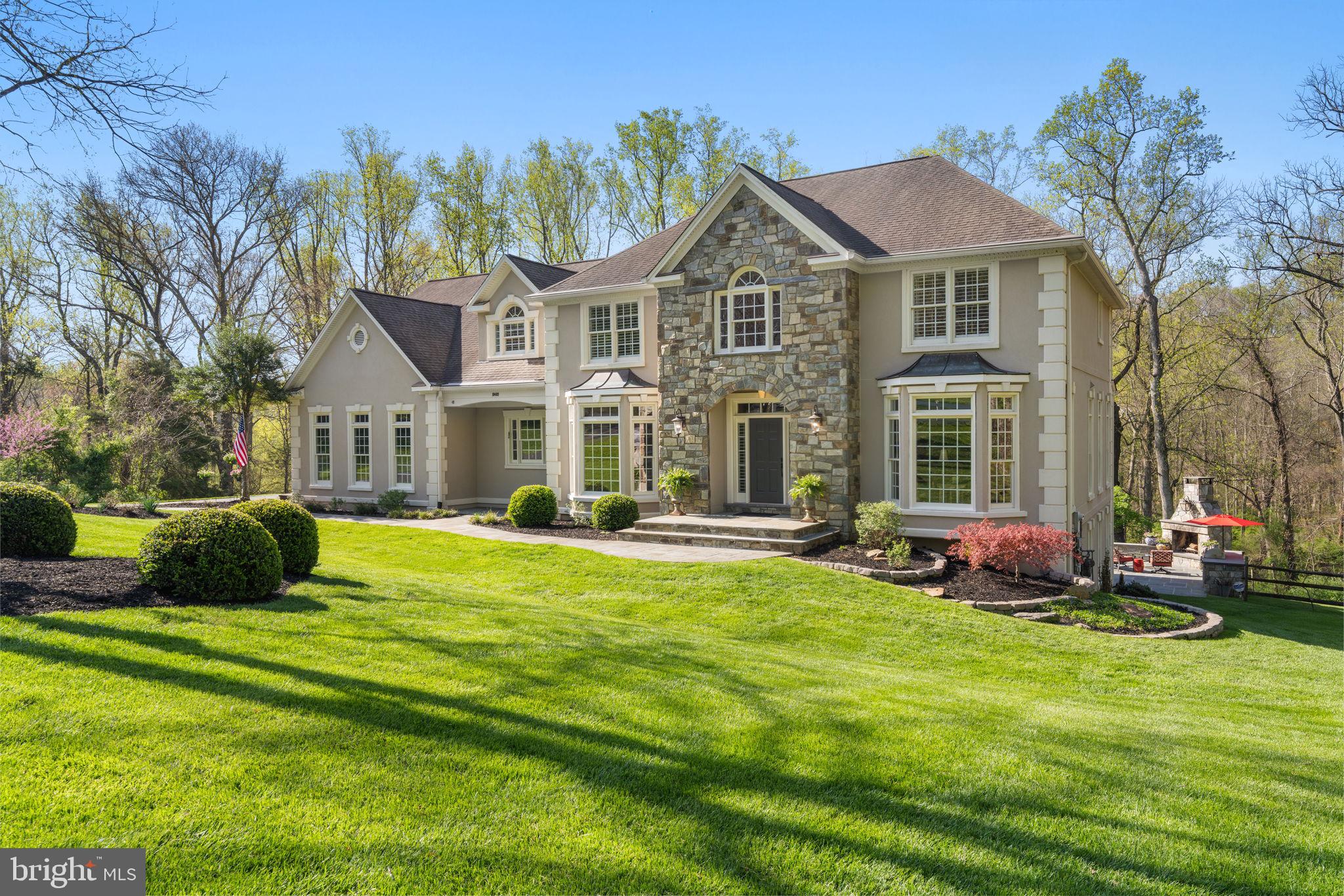 Tucked away on a private road off Hunter Mill Road, this elegant 4-bedroom, 5 1/2-bathroom, one-of-a-kind home offers nearly 6,200 square feet of refined living space on an expansive, private 2.97-acre lot.  Custom built by RJL Associates, this rare property blends surrounding natural elements with modern upgrades and meticulous attention to every detail, all highlighted by an idyllic woodland setting backing to Difficult Run stream.  You’ll be captivated by its stately curb appeal—mature trees, inviting flagstone walkway and front steps, rear multi-level Trex deck adorned by a cozy gazebo, circular staircase connecting to extensive hardscape below (2019), custom flagstone patio with quarry-stone fireplace (2019), built-in gas grill (2019) with its own umbrella for rainy days, relaxing porch swing, plus an expertly placed detached mini-patio overlooking Difficult Run, a nearby tree house, an on-property nature trail, an Amish-built shed to match the main house (2019) and so much more. Inside, a sun-lit and thoughtfully designed floor plan offers seamless flow and versatility, with dedicated spaces to suit every family's lifestyle and entertainment needs, all with an eye to incorporating the serene outside views. 

The main level is the heart of the home, beginning with the formal living room with a bay window overlooking the front yard. Pocket doors connect to a private study or library with built-ins that captures corner views of the property and the woods beyond. Across the two-story foyer, the gracious formal dining room showcases another bay window and provides direct access to a gorgeous gourmet kitchen equipped with a center island, high-end stainless steel appliances, custom copper vent hood, under-cabinet lighting and electrical, side-by-side panel front Sub-Zero fridge and freezer, gas cooking, and coffee station with dedicated water line, all spilling into the breakfast area with a wall of windows to forest views.  From here, step into the show-stopping family room, highlighted by another wall of windows with birds eye views of nature beyond, quarry stone gas fireplace with live-edge mantelpiece, hidden in-cabinet TV, and deck-access. 

The upper level features four generously sized bedrooms (3 newly carpeted-2025), each with its own ensuite bathroom, plus a sophisticated primary suite with wood flooring, private reading room or office space, two custom-built walk-in closets  (one with walk-in attic access), and a primary bathroom with heated tile floors, frameless walk-in shower, two rainfall shower heads, and Aqua Serenity Air Tub.  


The sprawling lower level boasts a custom English pub style bar (2020) with coffered ceiling to match the family room above, mirrored tile, and full-size beverage fridge niche, all seamlessly integrated with the adjacent game room with walkout patio access, an entertainment area (2020) with surround sound (2020), a home gym with sauna, a flex space, a Murphy bed for guests, a full recently updated bathroom, plus creative storage spaces and additional expansive unfinished storage with work bench and access to the outdoor patio beyond. 


With close proximity to Reston Town Center, Dulles Airport, Tysons, Great Falls Park, Wolf Trap Center for the Performing Arts, major commuter routes and Virginia wine country, this home offers luxurious living and unparalleled convenience in one of Northern Virginia’s most desirable areas. 

Additional information: Steps away from the W&OD Trail, No HOA, Public Sewer & Water, Natural Gas & Fios, Window Replacement (various), 2 HVACs (2022), 1 Furnace (2022), Lower Level Enhancements (2020), Lower Level Motorized Blinds (2018), Roof Replacement-30 year architectural shingles (2012), Gutter helmets (2021)