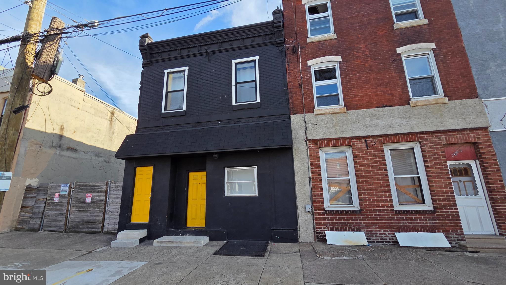 Rare mixed-use investment opportunity in the heart of rapidly transforming East Kensington! Offering a three-property package sale for $900,000, including 2603, 2605, and 2607 Frankford Avenue—all zoned CMX-2, providing exceptional flexibility for future redevelopment, commercial use, and long-term hold strategies. This stretch of Frankford Avenue continues to see strong momentum with new construction, local business growth, and neighborhood improvements, making this an ideal opportunity for investors, developers, and owner-users looking to secure a foothold in one of Philadelphia’s most active emerging corridors.

One of the biggest advantages of this package is the visibility and exposure that comes with being located directly along Frankford Avenue. Strategically positioned on Frankford Avenue, a major corridor with consistent traffic counts, offering exceptional branding and customer visibility, this location is ideal for an operator looking to establish a destination concept, capture neighborhood activity, and benefit from constant daily exposure.

The highlight of the package is 2607 Frankford Avenue, a unique industrial/garage-style building that spans from Frankford Avenue through to Amber Street, creating a rare through-lot footprint with multiple points of access. In addition to the expansive interior garage space, the property also features a generously sized driveway area with potential parking for approximately four vehicles, offering added convenience and versatility. Buyers can explore a wide variety of potential uses (subject to City approvals), including conversion into a trendy neighborhood destination such as a coffee shop, brewery/taproom concept, car wash, creative studio, maker space, or other high-demand commercial concepts that align with the continued growth happening throughout the area.

With three adjacent properties under the same CMX-2 zoning designation, this package presents an outstanding value-add opportunity for those seeking to reposition, redevelop, or hold for future appreciation as East Kensington continues to evolve. Buyer to verify zoning, permitted uses, and development potential with Philadelphia L&I and all appropriate professionals.