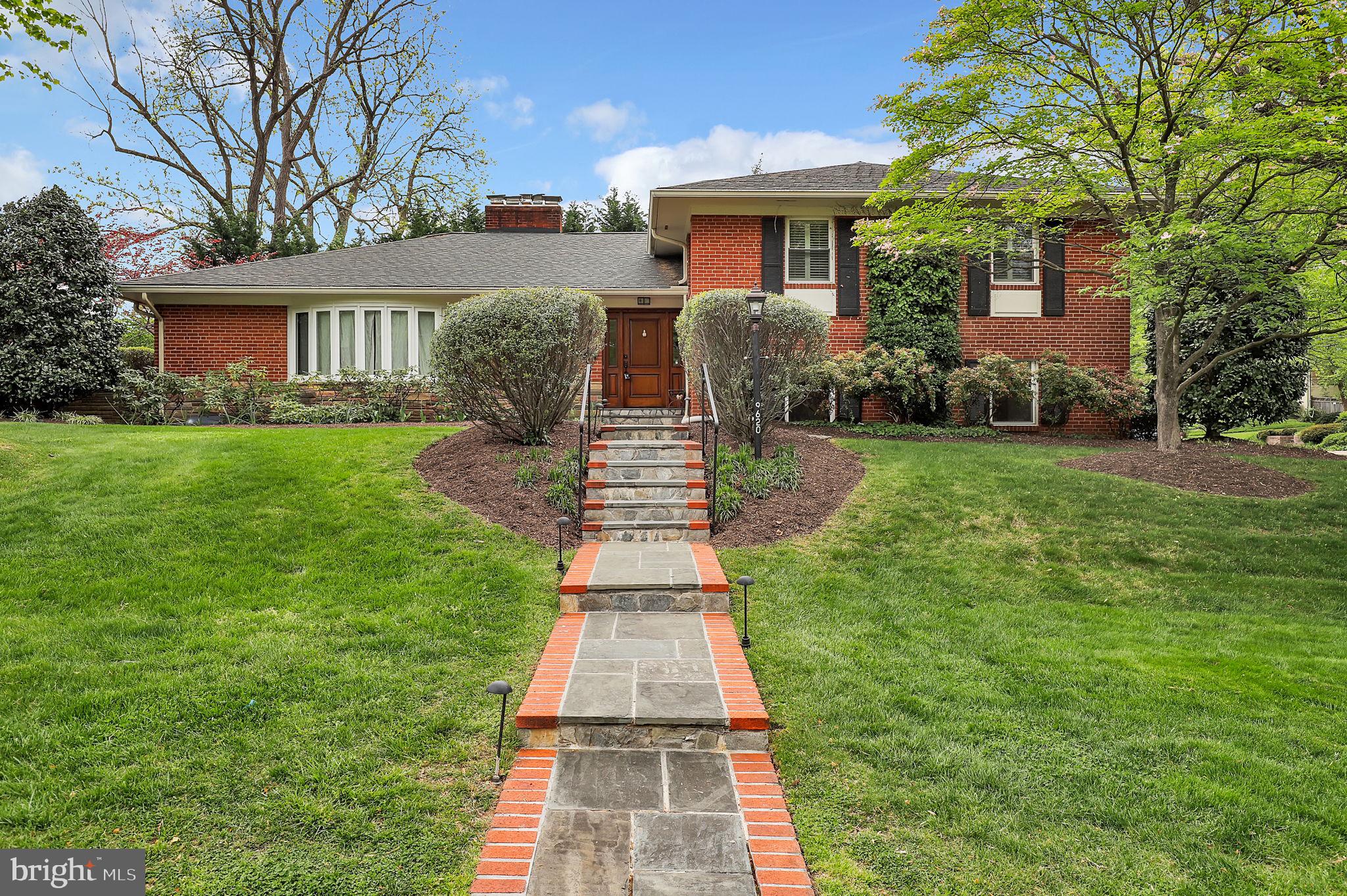 Step into this impeccably renovated and expanded home nestled in the highly coveted South Kensington neighborhood. Set on an expansive, verdant lot, this residence enjoys a premier position backing onto Rock Creek Park, granting direct access to its picturesque trails. Benefit from the convenience of top-tier schools and effortless commuting, thanks to its proximity to major routes and public transit. This welcoming split-level home, positioned on a corner lot in the charming Rock Creek Hills neighborhood of Kensington, exudes a timeless allure and contemporary sophistication. Enhanced with a plethora of updates and unique features, including three fireplaces and a chef's dream kitchen, this home is sure to enchant. Upon entry, be greeted by the grand foyer adorned with stunning oak floors, leading seamlessly into a thoughtfully designed layout that effortlessly blends everyday living and entertaining spaces. The main level showcases an elegant living room adorned with windows on two sides, framing breathtaking views, which seamlessly transitions into an open-plan kitchen and dining area. The kitchen, recently renovated to perfection with top-of-the-line finishes, adjoins a cozy sitting room and a sunlit family room overlooking the enchanting patio. Upstairs, discover three bedrooms and two full baths, including a sprawling primary suite boasting cathedral ceilings, a generous walk-in closet, and a lavish bath. Access to additional storage is provided through the walk-in closet's attic access. The lower level offers additional living space, comprising a spacious recreation room, a well-appointed bar area, and ample storage. Conveniently nestled between the upper and lower levels are a fourth bedroom, an office (or fifth bedroom), and a third full bath, providing privacy for guests or accommodating work-from-home arrangements. Outside, relish in the pleasures of the fully fenced backyard enveloped in lush landscaping, complete with a patio perfect for endless BBQs. A two-car garage and driveway offer ample parking. Meticulously maintained and boasting a multitude of updates, this home effortlessly combines luxury with comfort. Situated in the wooded sanctuary of Rock Creek Hills, it offers easy access to downtown Kensington's vibrant shops and restaurants, the Marc Train, and The Children's Library. Future access to the Purple Line Metro, along with its proximity to Walter Reed Medical Center, NIH, and downtown Bethesda, Silver Spring, and Washington, ensures commuting is a breeze. Outdoor enthusiasts will delight in the neighborhood's scenic running and biking trails, as well as the nearby Kensington Cabin Park's amenities. With its prime location and array of features, this home epitomizes the perfect blend of comfort and convenience.
