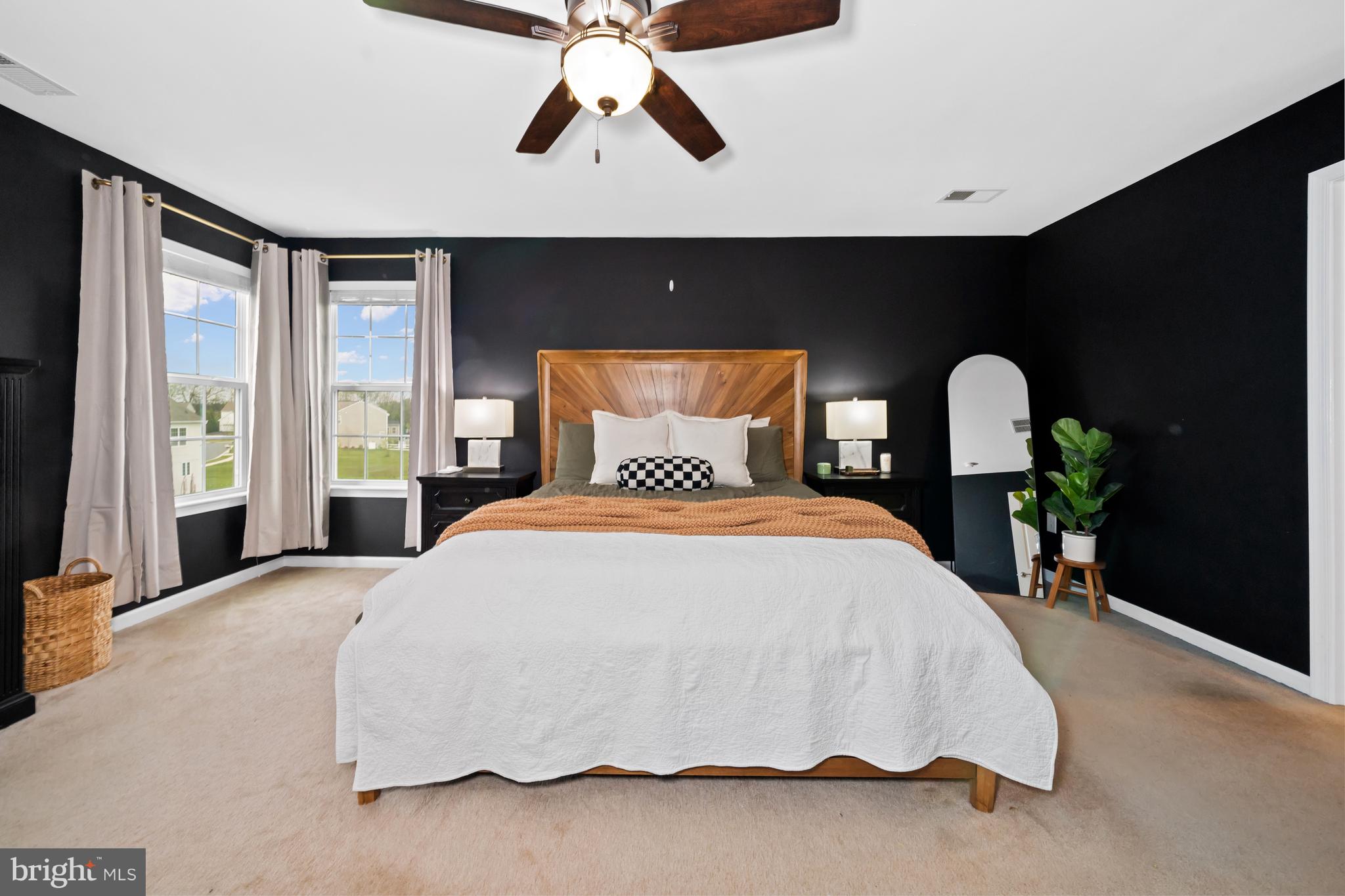 Welcome to 431 Georgiana Dr located in the Crossland at the Canal in Middletown, Delaware. Built in 2015, this beautifully maintained home has 5 bedrooms, 3 full and 1 half baths. Open concept kitchen, espresso colored cabinets, granite countertops, stainless steel appliances and pantry. The breakfast area leads to a bright sunroom and screened in porch (32x14). Beyond the living room with fireplace, you'll find a main floor bedroom and adjoining full bath. Upstairs has another primary suite with private bath and walk in closet, as well as 3 other nicely sized bedrooms sharing a hall bath and the conveniently located laundry space.  The basement is fully finished and adds over 1,000 additional square feet of living space, along with another bathroom and plenty of storage. The rear yard is fenced and includes garden beds, there's also generator for peace of mind and an attached 3 car garage. Close to Rt 1 for easy commutes north or south. Schedule your showing today and make 431 Georgiana your new home.