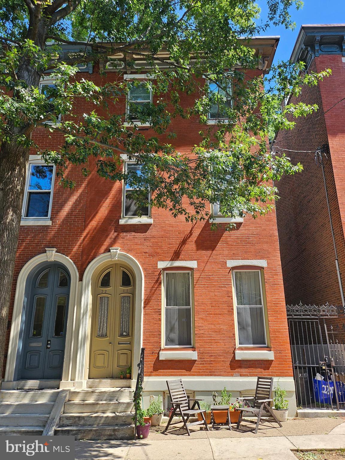 Welcome to 2211 Mount Vernon Street; this is an unique investment opportunity features a well-maintained four-unit multi-family property in the heart of the Fairmount area.  Situated on a prime, tree-lined block, this fully occupied building offers significant potential for immediate rental income.
The property features separate electric meters and a fire system. The building configuration includes:
- First Floor: A one-bedroom, one-bathroom unit plus a den, featuring a fireplace and a private red-brick garden/rear yard.
  - Second Floor Front: A studio apartment with carpeting, a kitchen and a full bath.
  - Second Floor Rear: A one-bedroom unit with a large bay window and an eat-in kitchen.
  - Third Floor: A two-bedroom, one-bathroom unit with pine floors and an eat-in kitchen.
  - Basement: Common area with storage and coin-operated laundry facilities 
The location provides convenient access to the Benjamin Franklin Parkway, major museums, and Center City.