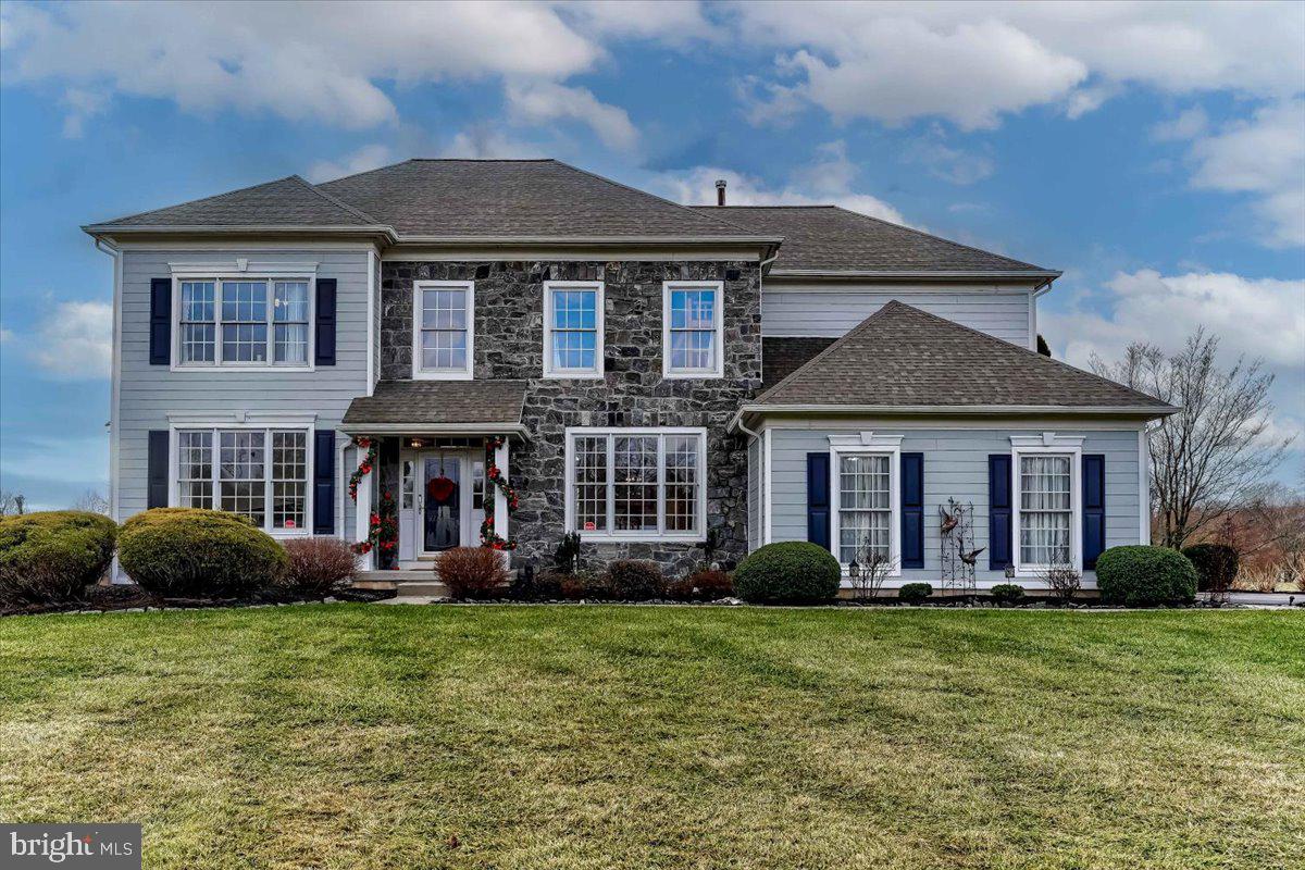 Exceptional meticulously maintained 5 bedroom, 4.5 bath Pulte built colonial home nestled on the Hickory Drive  cul-de-sac in the sought after Brookside community of Glen Mills; just across from the Garnet Valley School campus, the Concord Township Park, Dog Park and Rachel Kohl Library, complimented by a beautifully landscaped premium 1.4 acre level lot, with fabulous indoor & outdoor living spaces, perfect for expanded gatherings & entertaining.  Easily accessible to the Brandywine Youth Club, dance studios, Darlington Arts Center, dog parks & all commuting routes to corporate centers, Delaware tax free shopping, airports, Philadelphia, Wilmington, Media, West Chester & more. This stunning  turnkey home has been lovingly maintained & features countless custom upgrades and updates inside and out by the current owners, who are only selling due to an out of country relocation, and has everything a family could possibly desire including an exquisite gourmet chef’s kitchen, a fantastic daylight walk out finished lower level providing 1,104 square feet of additional living space that includes a great room, a 5th bedroom with a large walk in closet and there is a full  bath; perfect for nanny or in-law suite,  and walks out to the paver patio, hot tub and sprawling backyard.  This home is breathtaking inside & out in every way from its lushly landscaped yard, its grand stone & Hardie plank front exterior, a charming main entry portico that walks into the grand towering main entry foyer and an open functional floor plan.  A formal living room flanks the main entry foyer to the left with lots of natural light via its bay window looking out to the side yard and triple adorned by crown moulding. To the right of the main entry foyer is a lovely formal dining room with custom trim mouldings that is adjacent to the gourmet kitchen and easily accessible via a butlers pantry.  The tiled gourmet chef's kitchen features lovely cherry cabinetry, all new stainless appliances and a center island with an updated Jenn Aire cook top with a downdraft exhaust, granite counters, tile backsplash, a large walk-in butler’s pantry, pendant lighting, double wall ovens, built in microwave, and a sunny breakfast room that walks out to the enclosed sunroom with walk out access to a low maintenance walk down deck leading to the backyard and lower patio.   The gourmet kitchen and breakfast room is open and adjacent to the large and spacious grand two story family room featuring lots of natural light via the large two story wall of windows, a cathedral ceiling and a cozy gas fireplace.   Another great feature located on the main level is a private main level office that is adjacent to a half bath for convenience. There is a mudroom off the kitchen with convenient indoor access to the two-car garage and main level laundry room with built in cabinetry. On the upper level, you'll find a luxurious and grand master suite with breathtaking views over the backyard, an inverted octagonal pan ceiling, an oversized walk-in closet, a tiled ensuite master bath featuring double vanity's, a whirlpool tub, a separate stall shower and a private water closet. Completing the upper level are three additional spacious bedrooms including a Jack & Jill Suite with a shared bath and a Princess Suite with its own private bath. The finished basement has a large open & functional great room, sitting area as well as a spacious 5th bedroom that has walk in closet and there is a full bath also located on the lower level as well as a large storage and utility area.   Additional updates & upgrades include new Hardie plank and stone front exterior (2021), newer HVAC system (2014), newer tankless water heater (2015)  newer roof (2014), all new carpet (2023), complete interior repaint (2023) all new lighting (2023) and more.  This lovely well-updated & maintained home is move-in ready w/ nothing to do but enjoy all that this exceptional home has to offer.